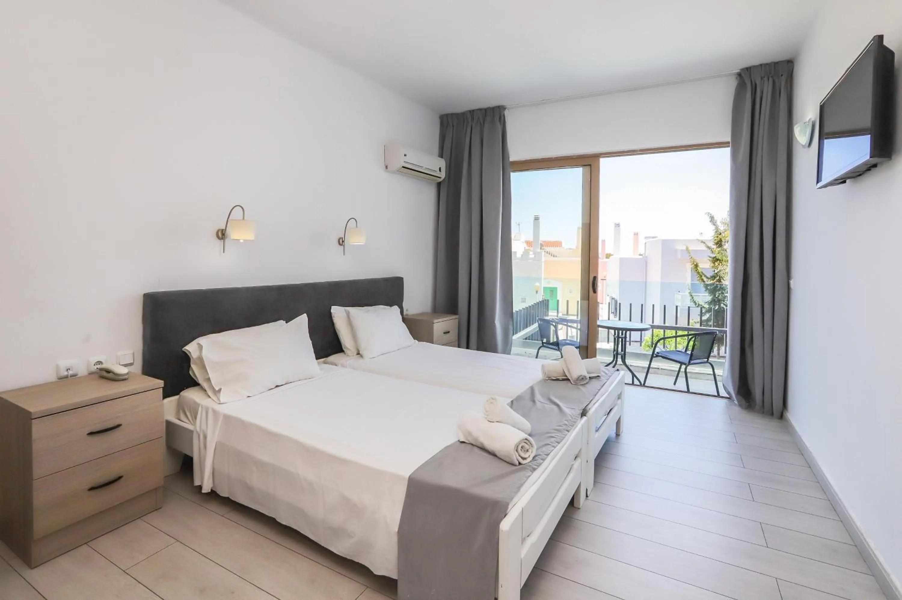 Bed in BELVITA Hotel