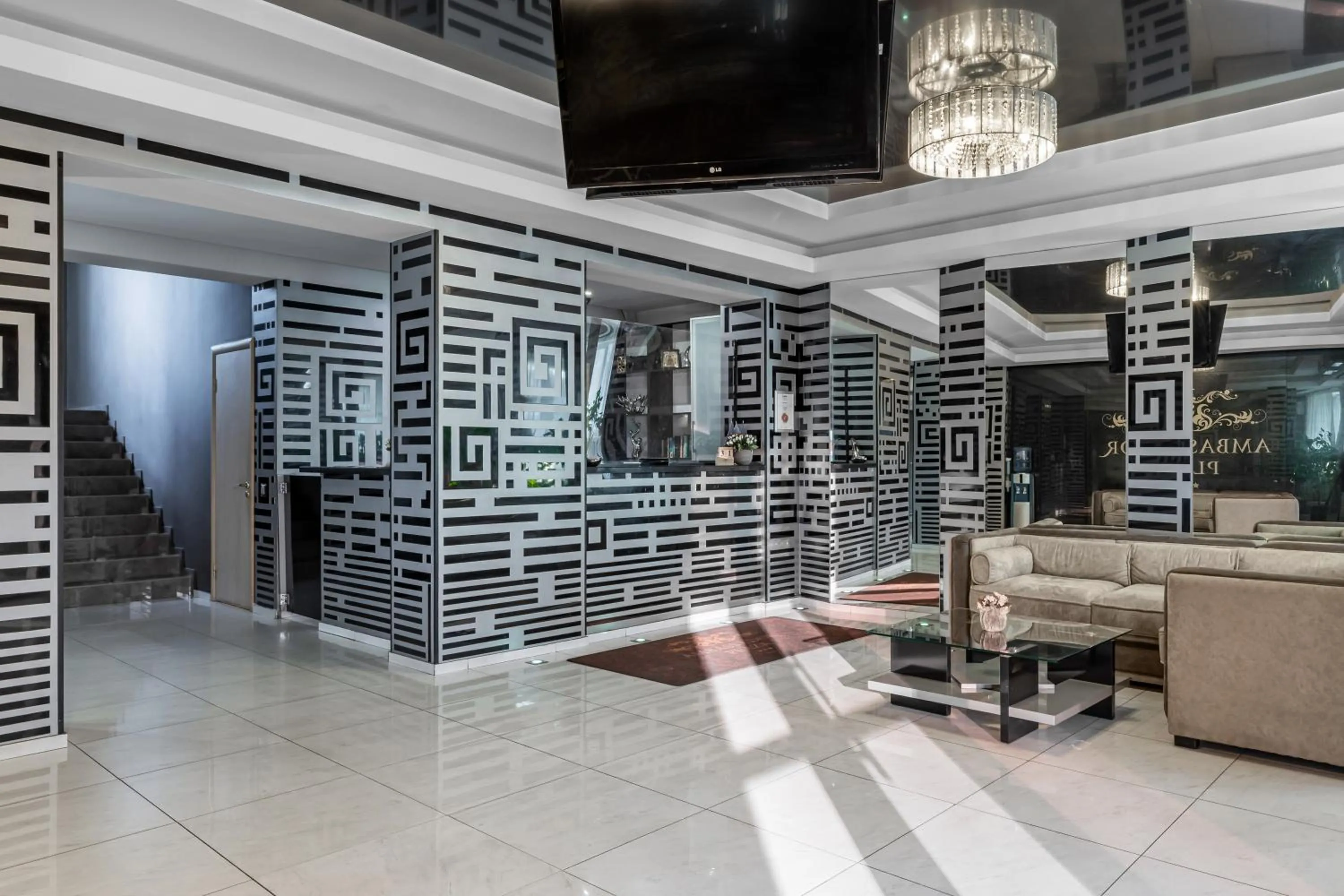 Communal lounge/ TV room in Ambassador Plaza