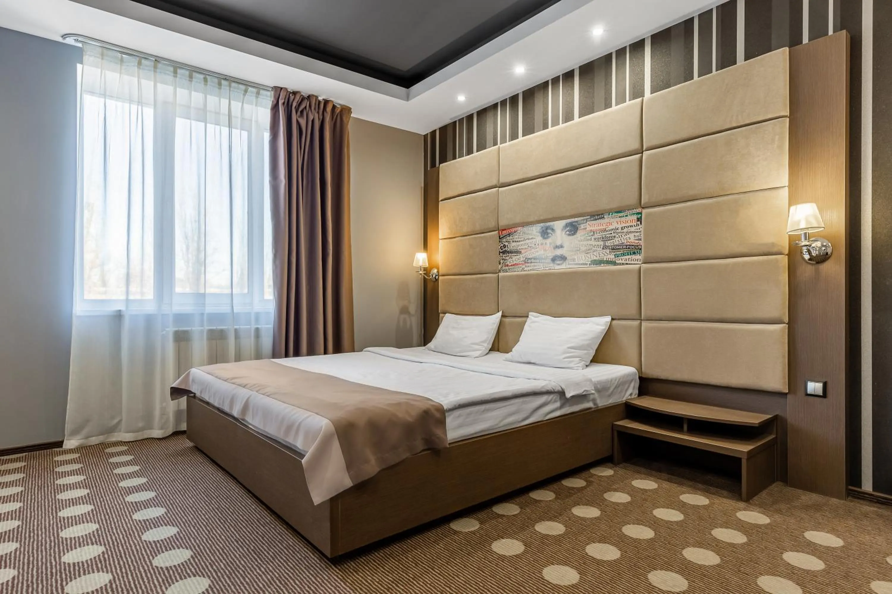 Bed in Ambassador Plaza