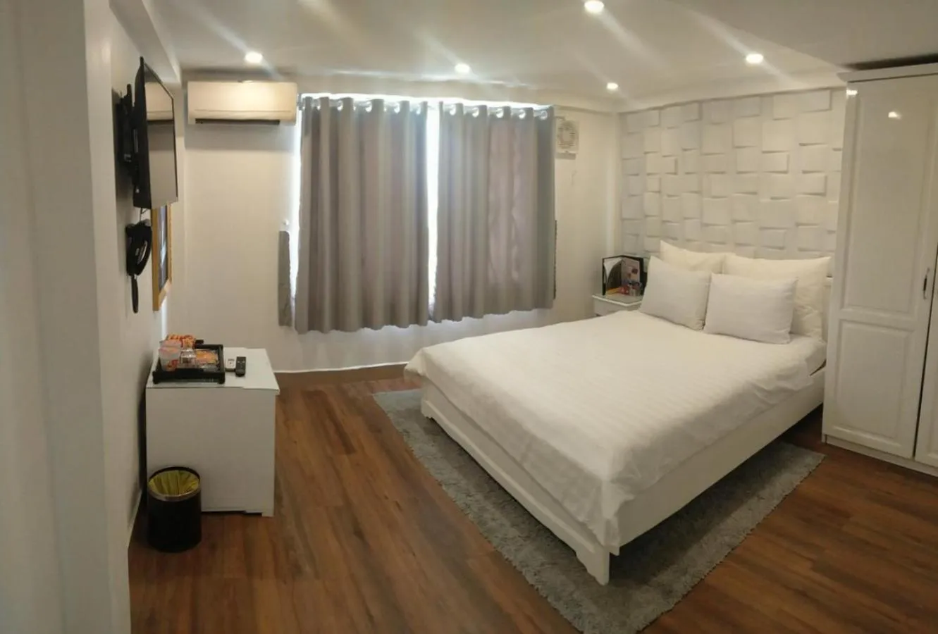Bed in Galaxy Hotel