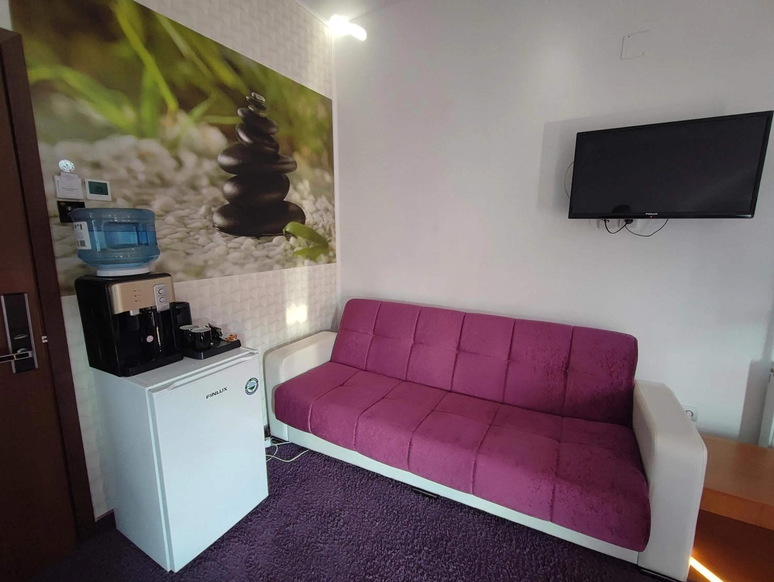 Photo of the whole room in Iris SMART Boutique Self Check-in 24h
