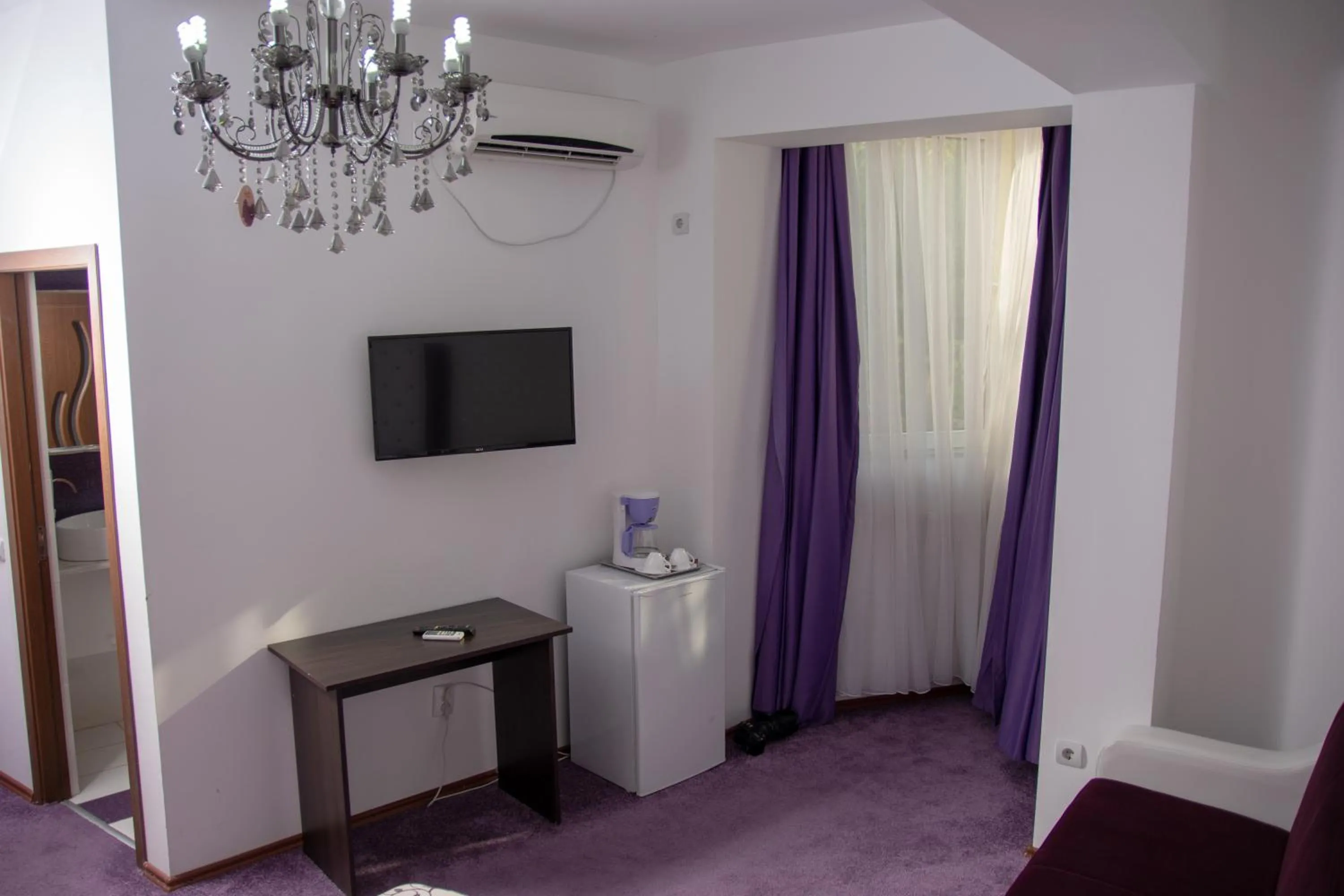 Photo of the whole room in Iris SMART Boutique Self Check-in 24h