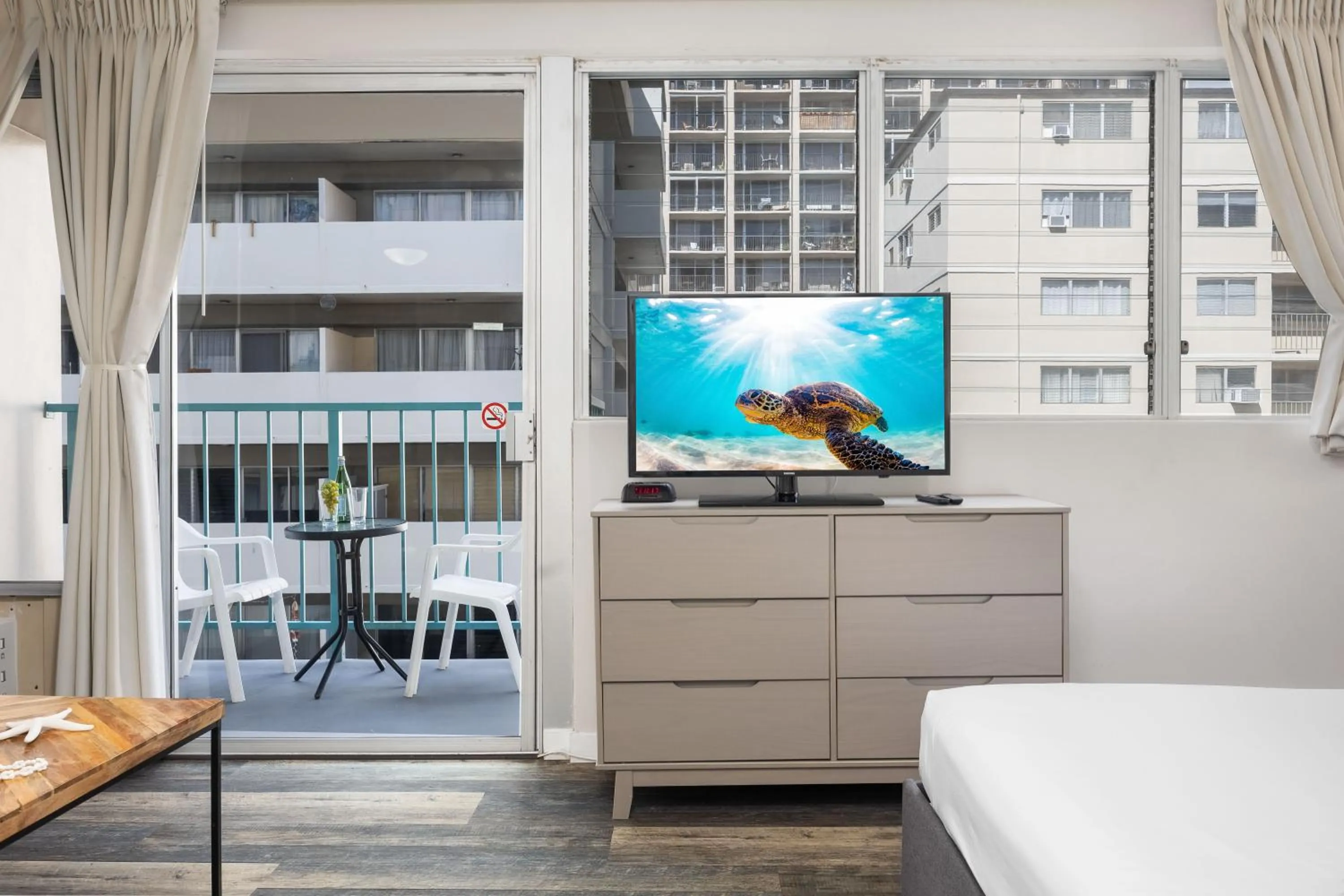 TV and multimedia in Renovated Studio with Pool Access at Aloha Surf