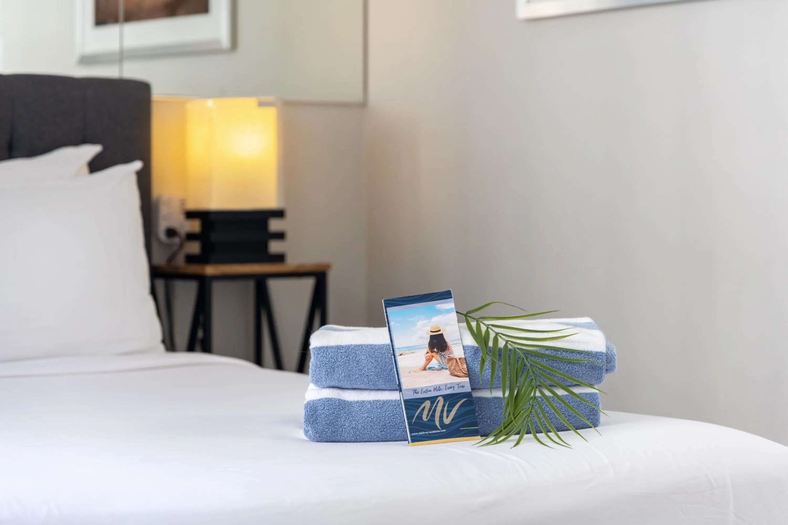 towels, Bed in Renovated Studio with Pool Access at Aloha Surf