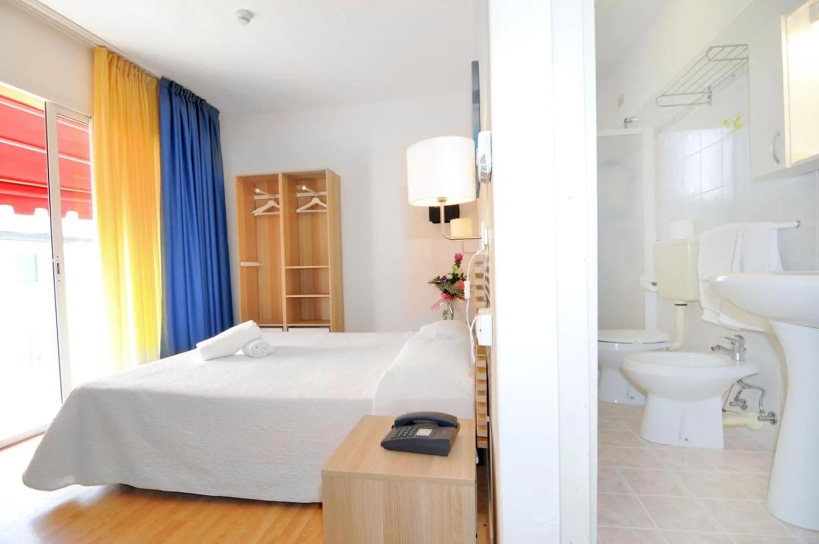 Toilet, Bed in Hotel Rex