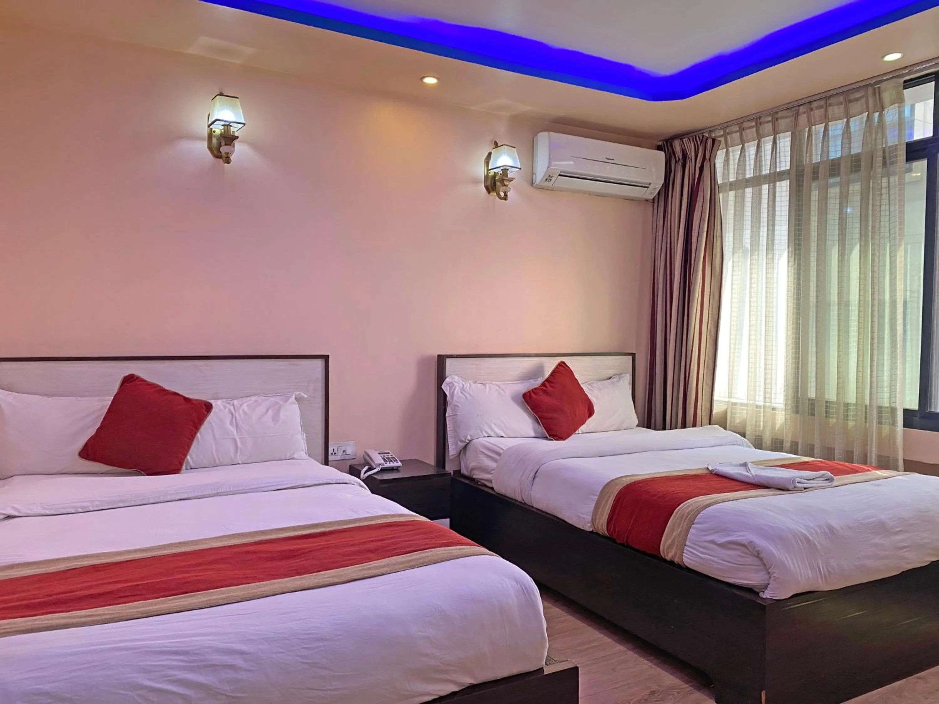 Bed in Hotel Readers Inn Pvt.Ltd