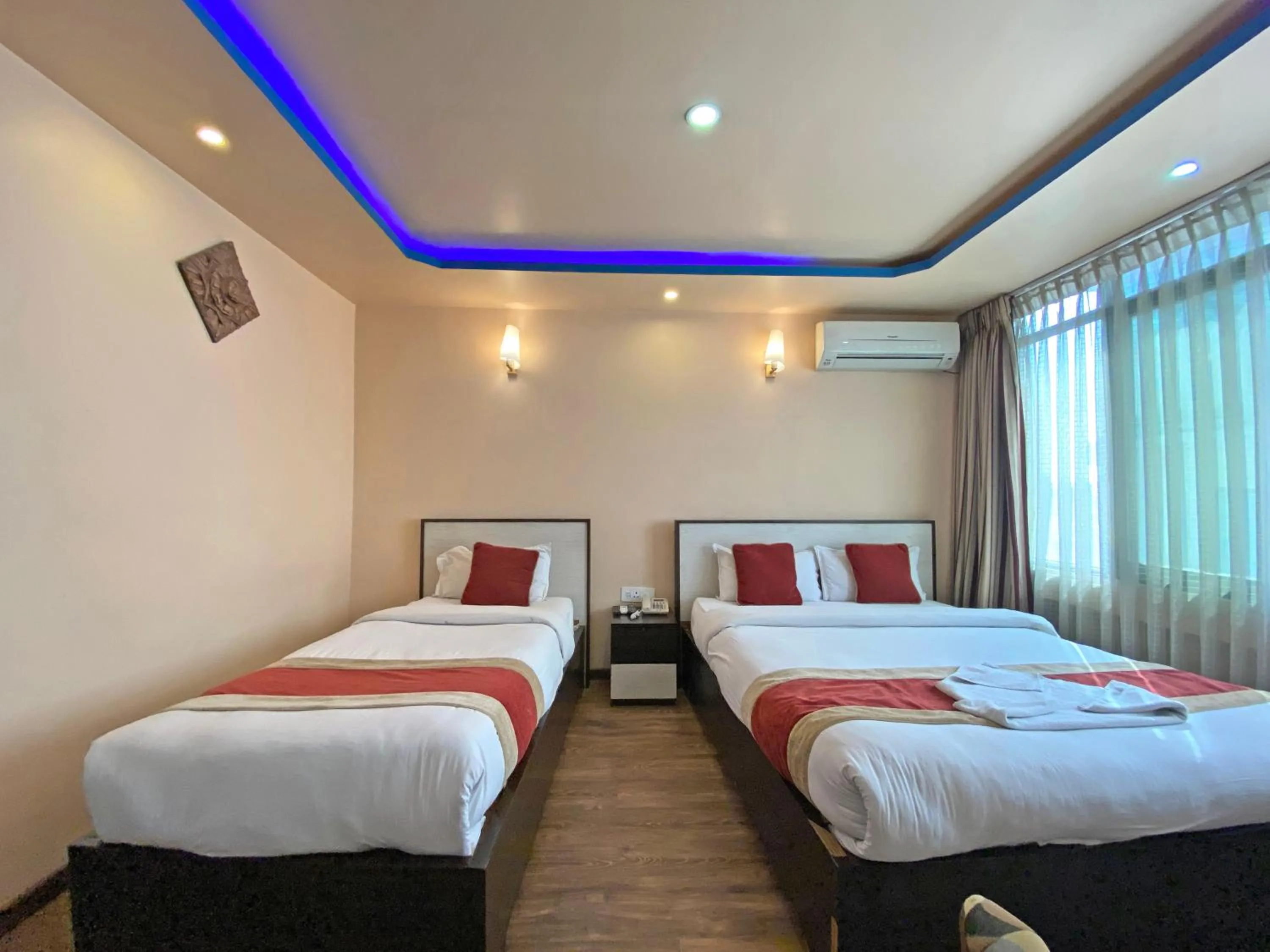 Bed in Hotel Readers Inn Pvt.Ltd