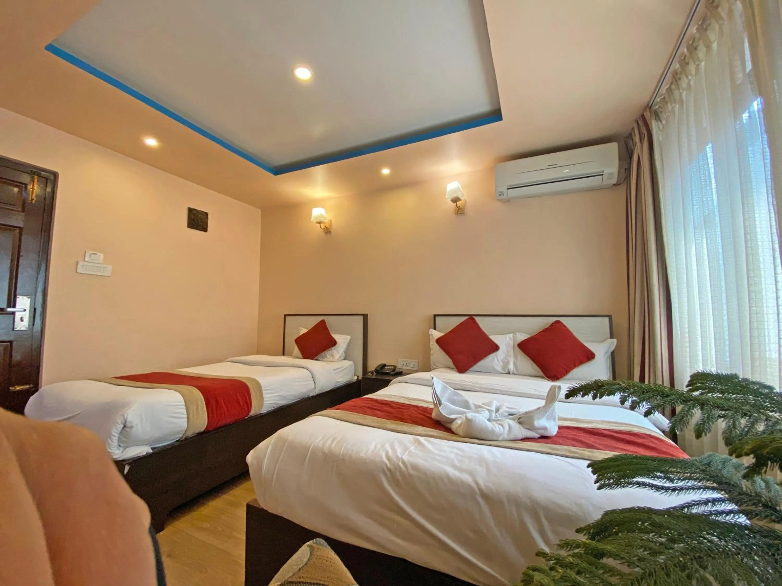 Bed in Hotel Readers Inn Pvt.Ltd