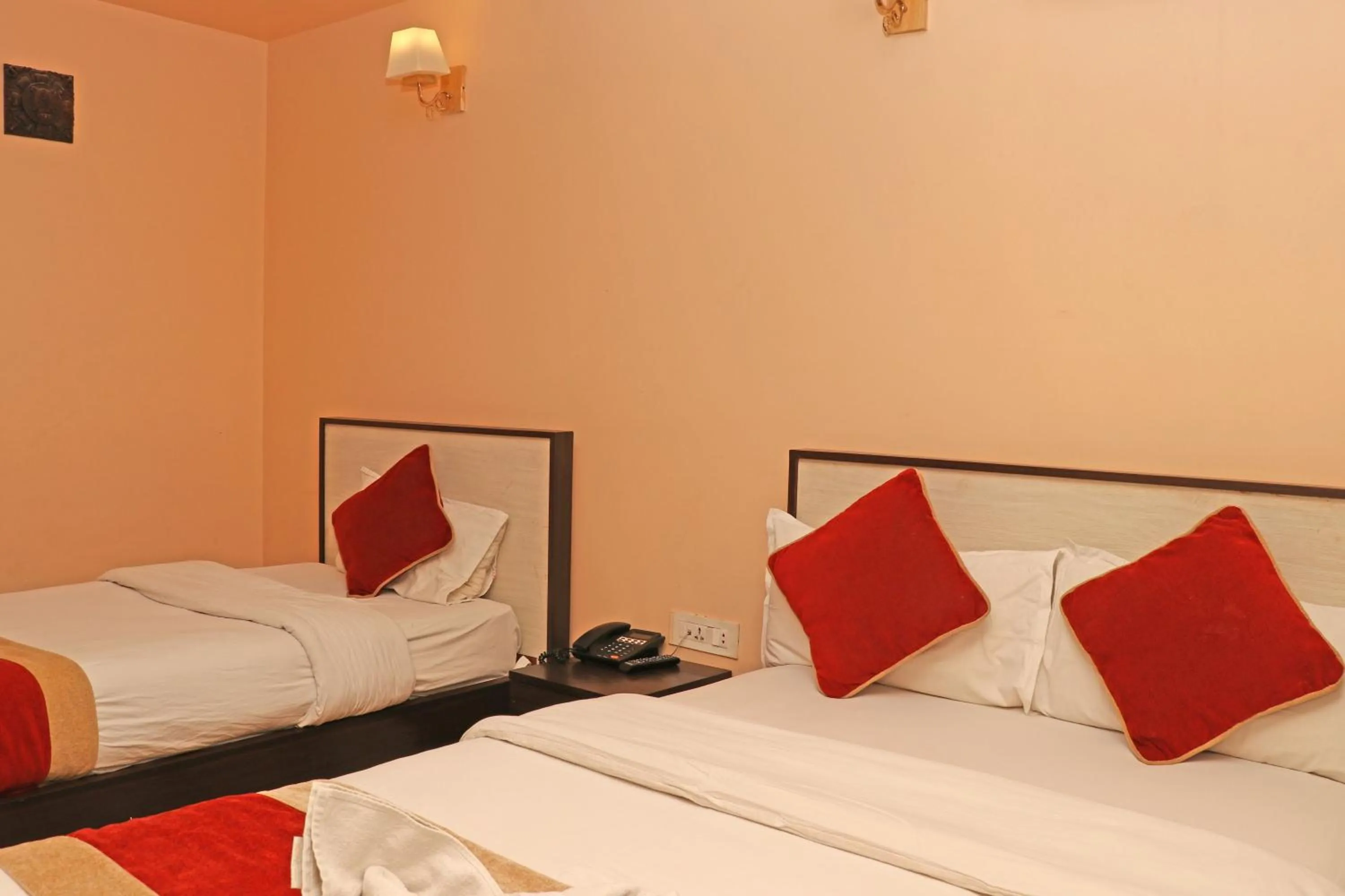 Bed in Hotel Readers Inn Pvt.Ltd