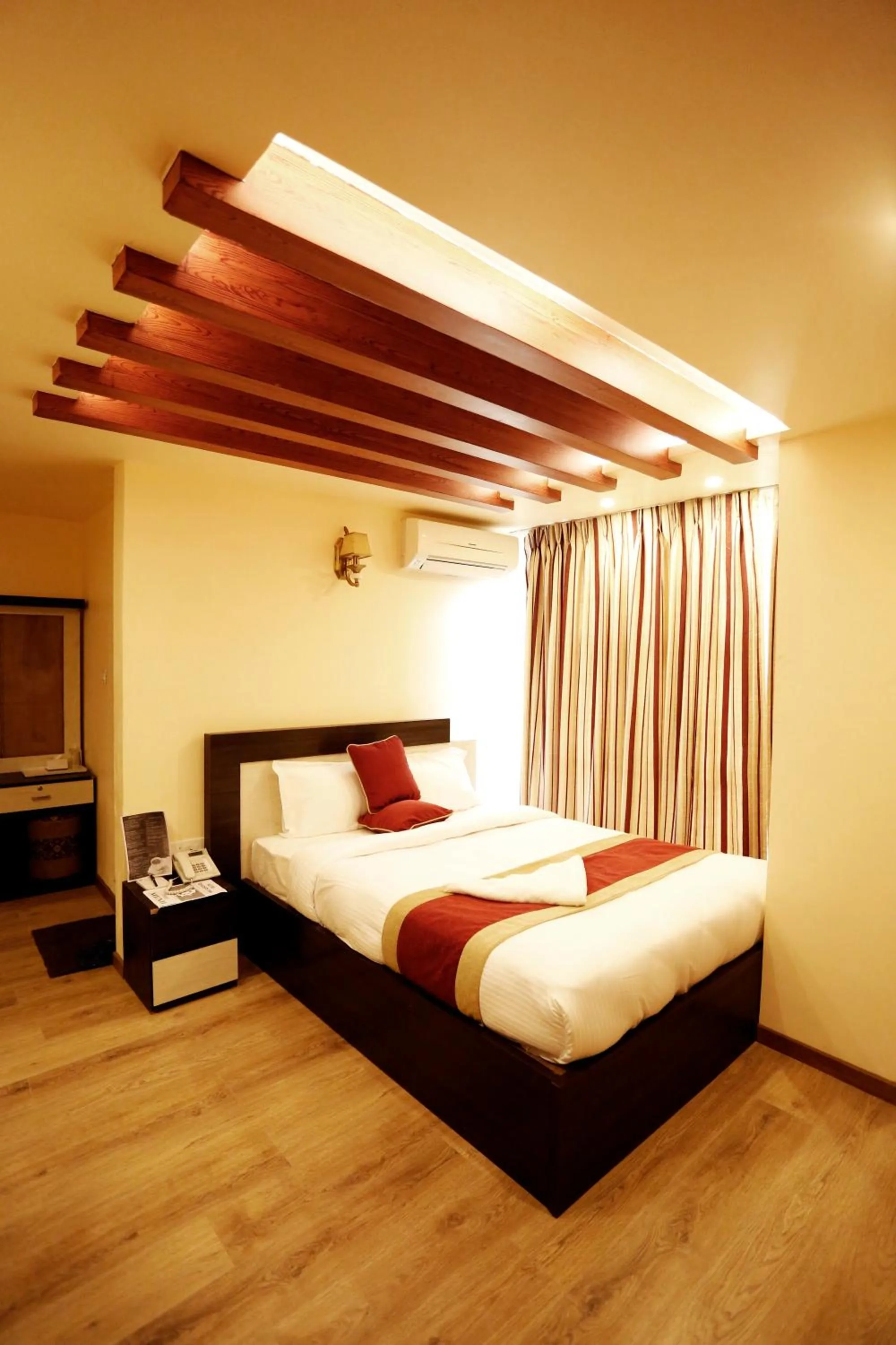 Bed in Hotel Readers Inn Pvt.Ltd