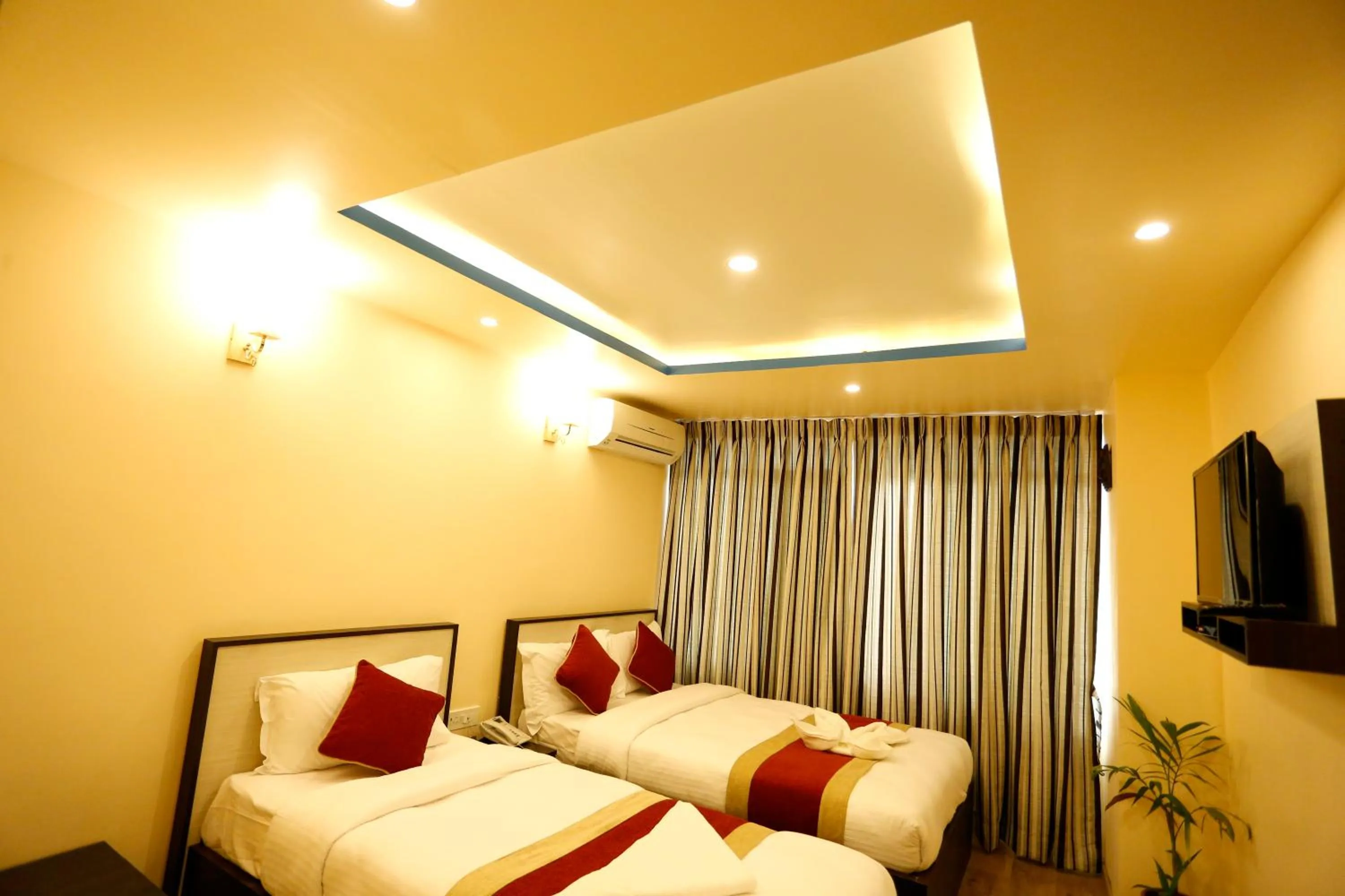 Bed in Hotel Readers Inn Pvt.Ltd
