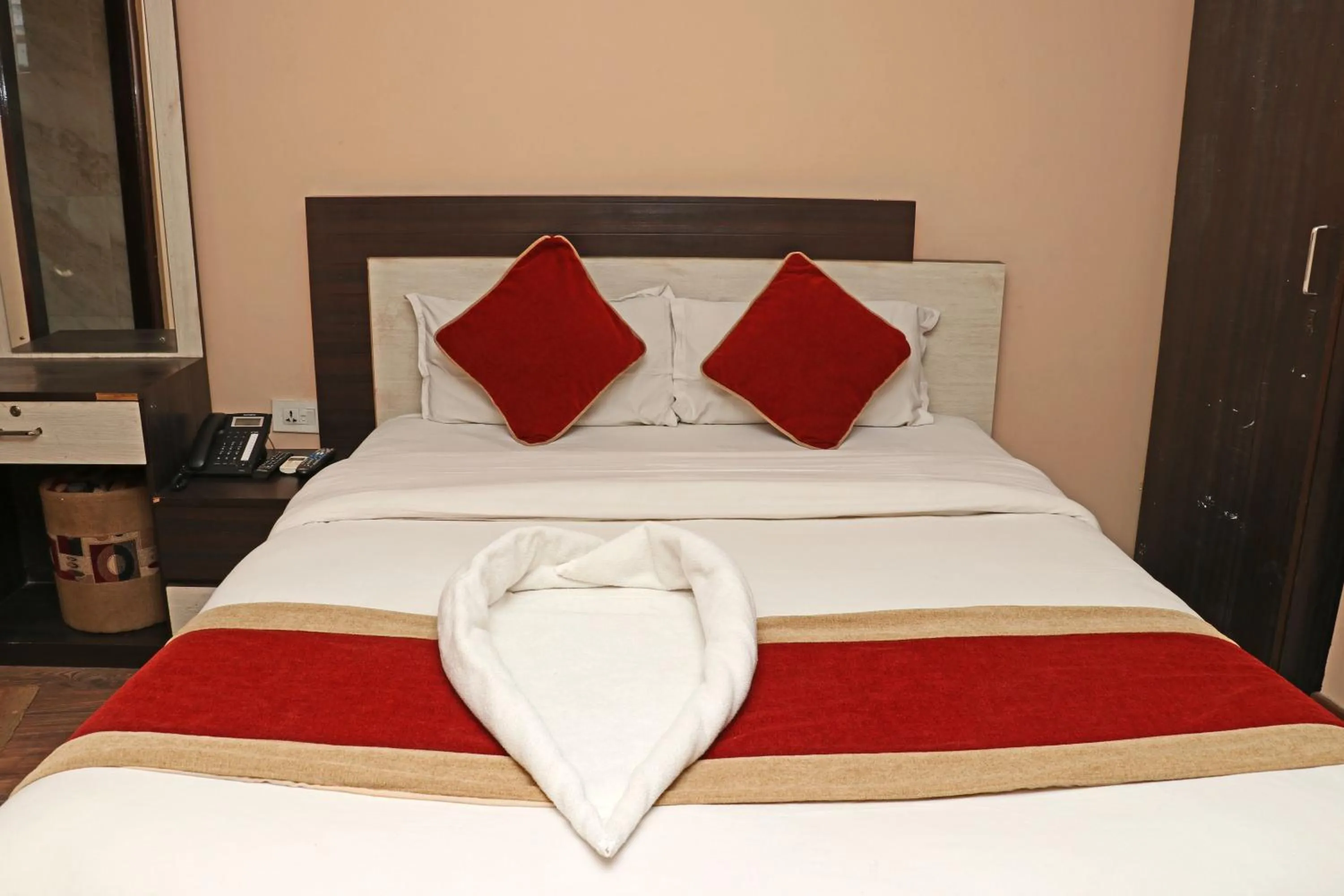 Bed in Hotel Readers Inn Pvt.Ltd