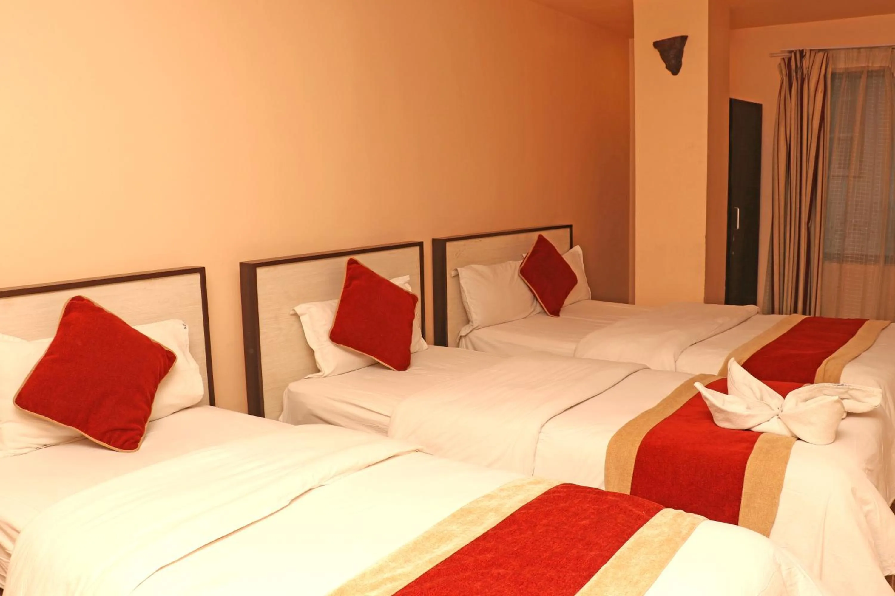 Bed in Hotel Readers Inn Pvt.Ltd