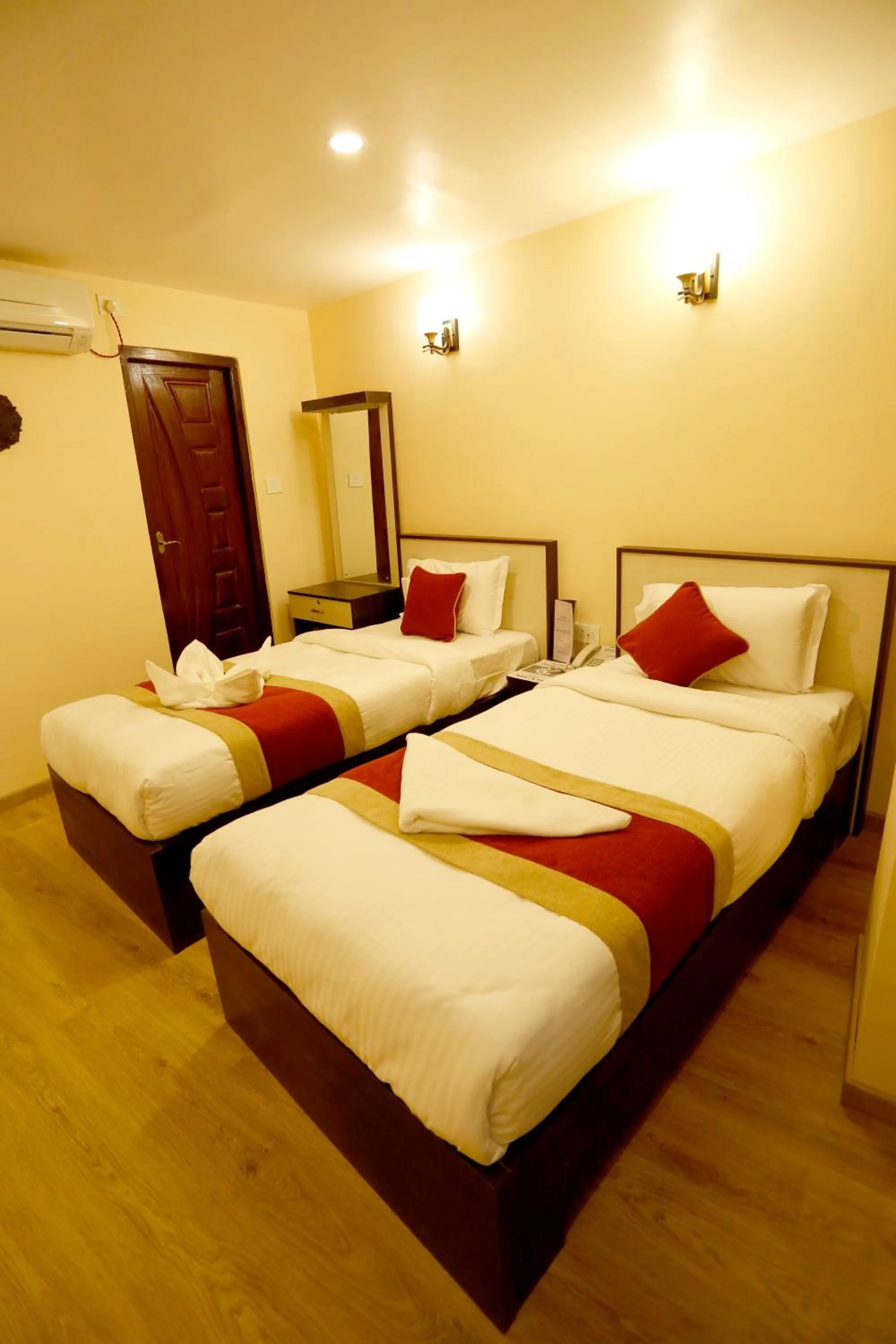 Bed in Hotel Readers Inn Pvt.Ltd