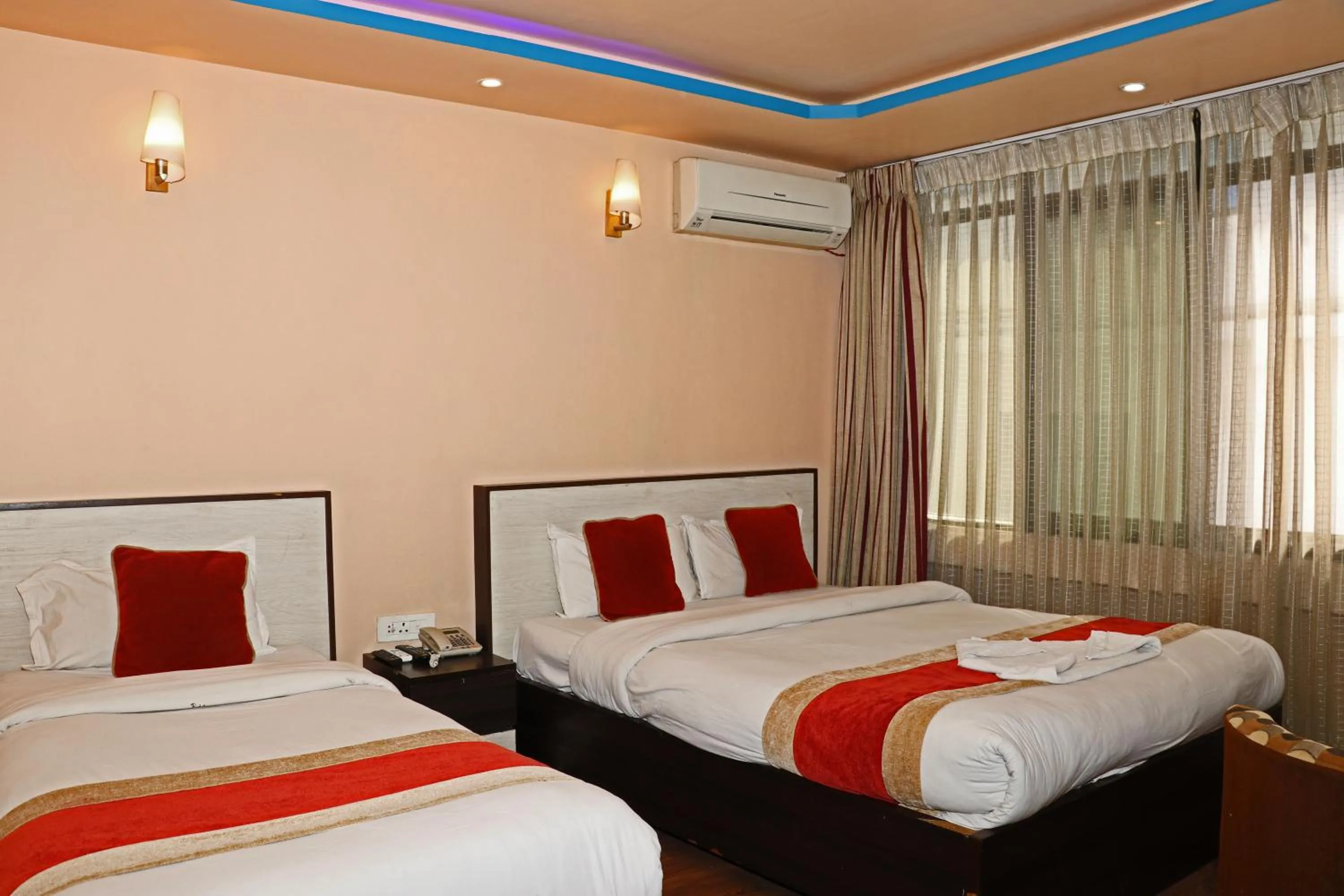 Bed in Hotel Readers Inn Pvt.Ltd