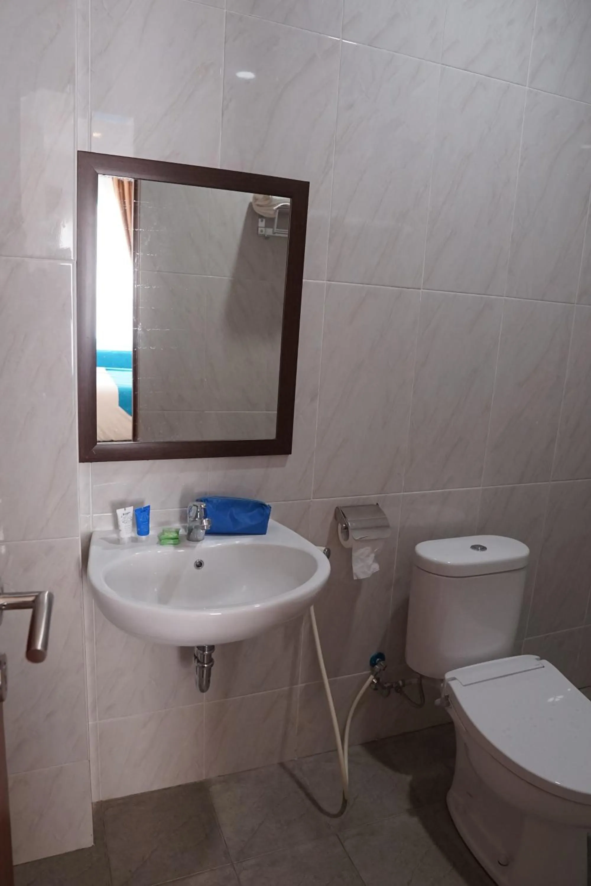 Bathroom in Cemerlang Inn
