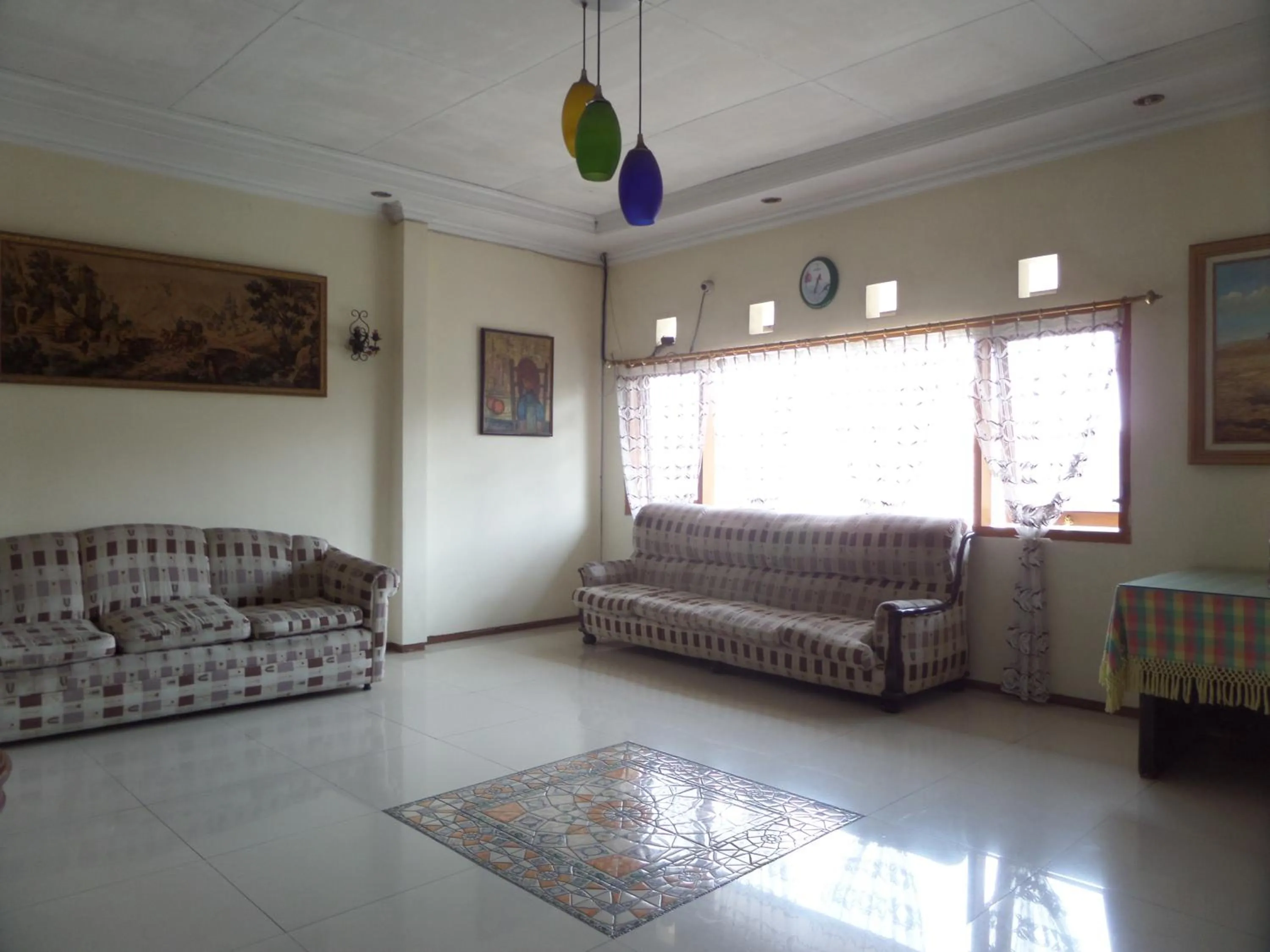 Communal lounge/ TV room in Armi Hotel Malang