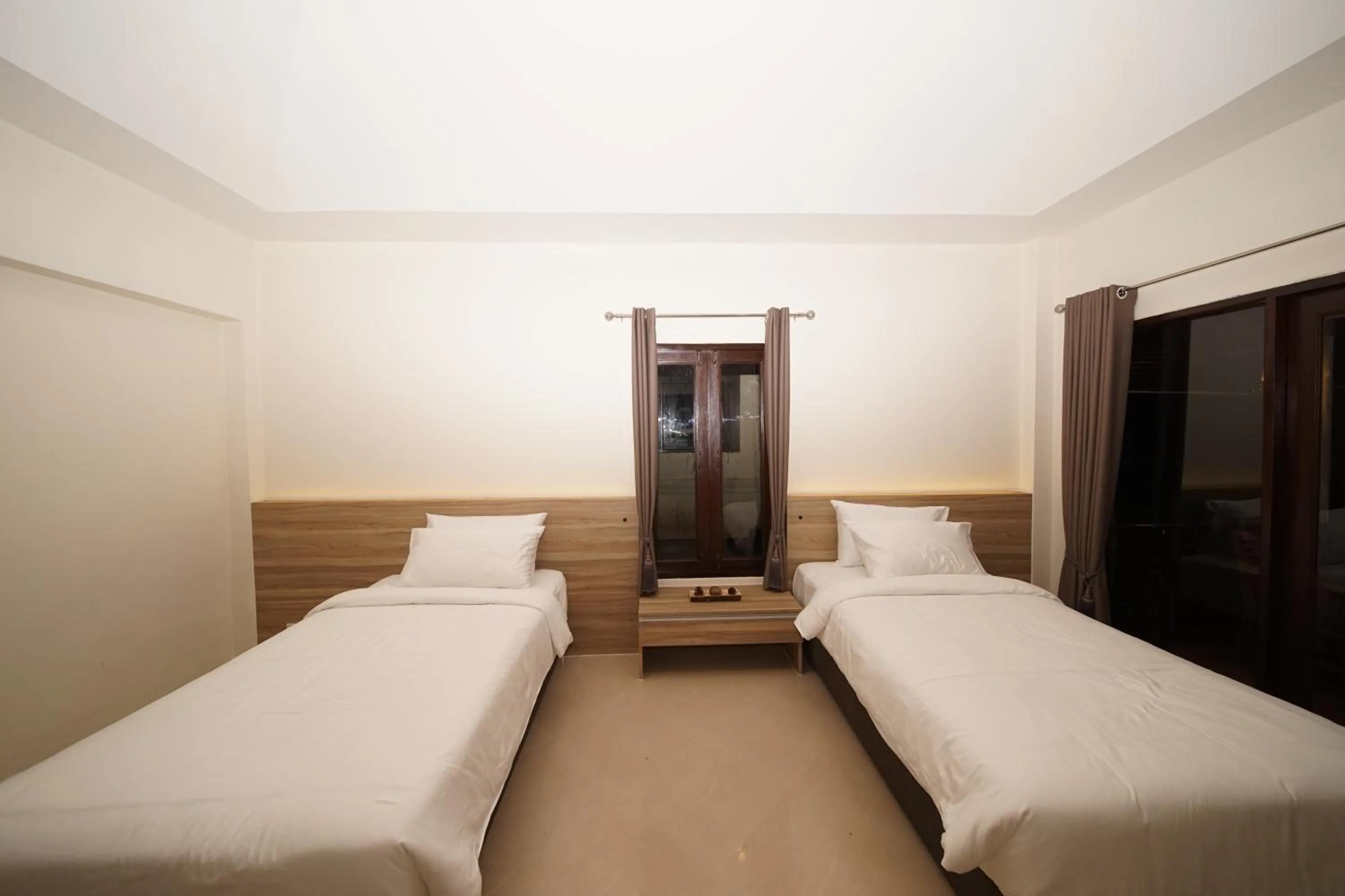 Bed in Aquavana Haad Rin Resort