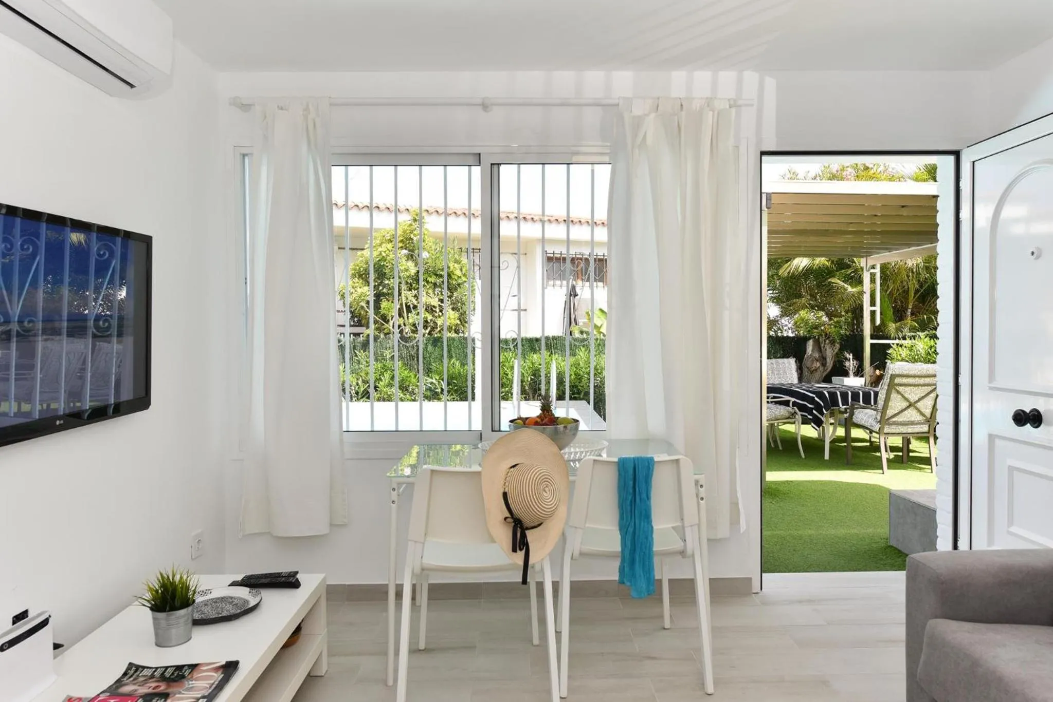 TV and multimedia in Beach House with private pool in San Agustín ET2 by VillaGranCanaria