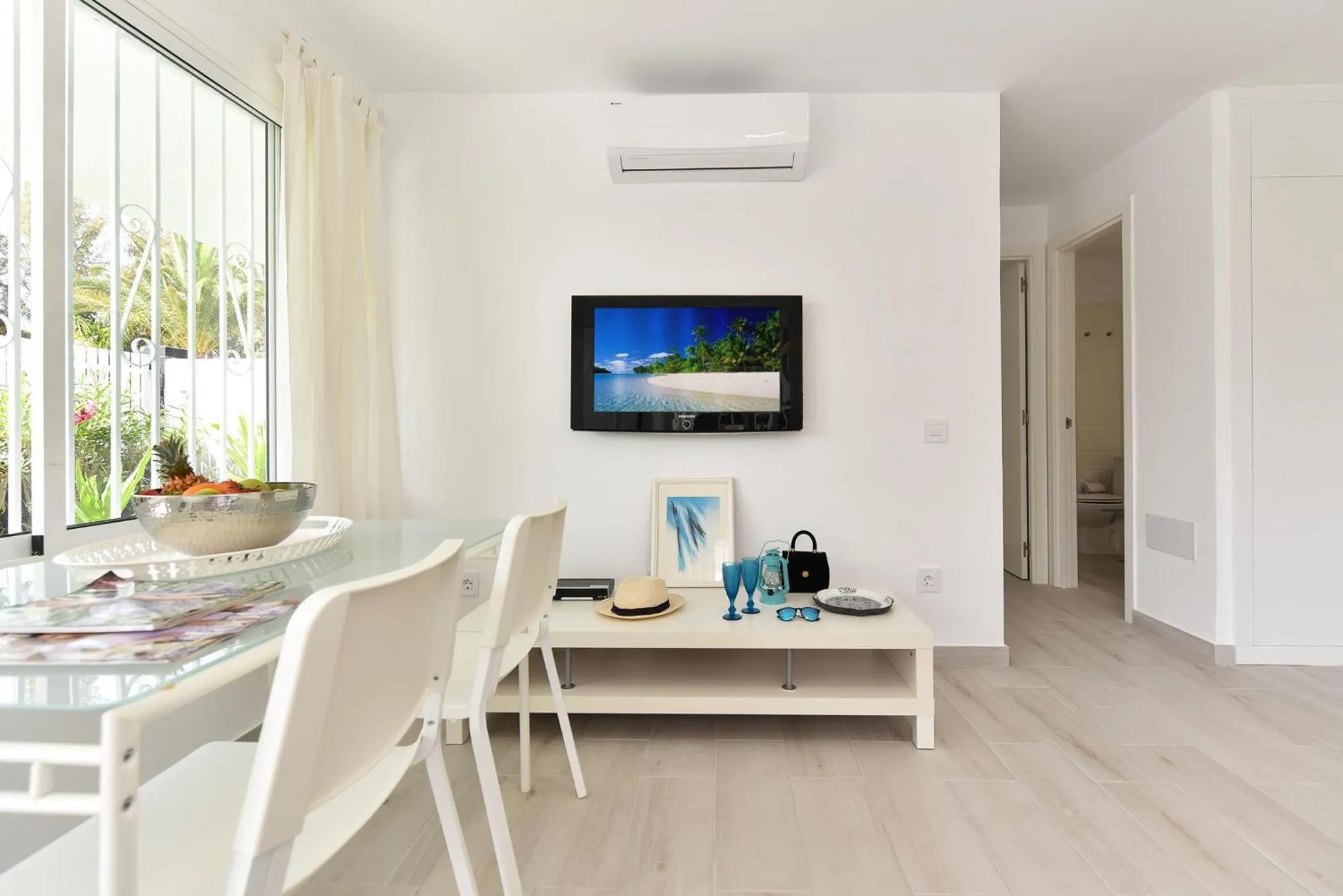 TV and multimedia in Beach House with private pool in San Agustín ET2 by VillaGranCanaria