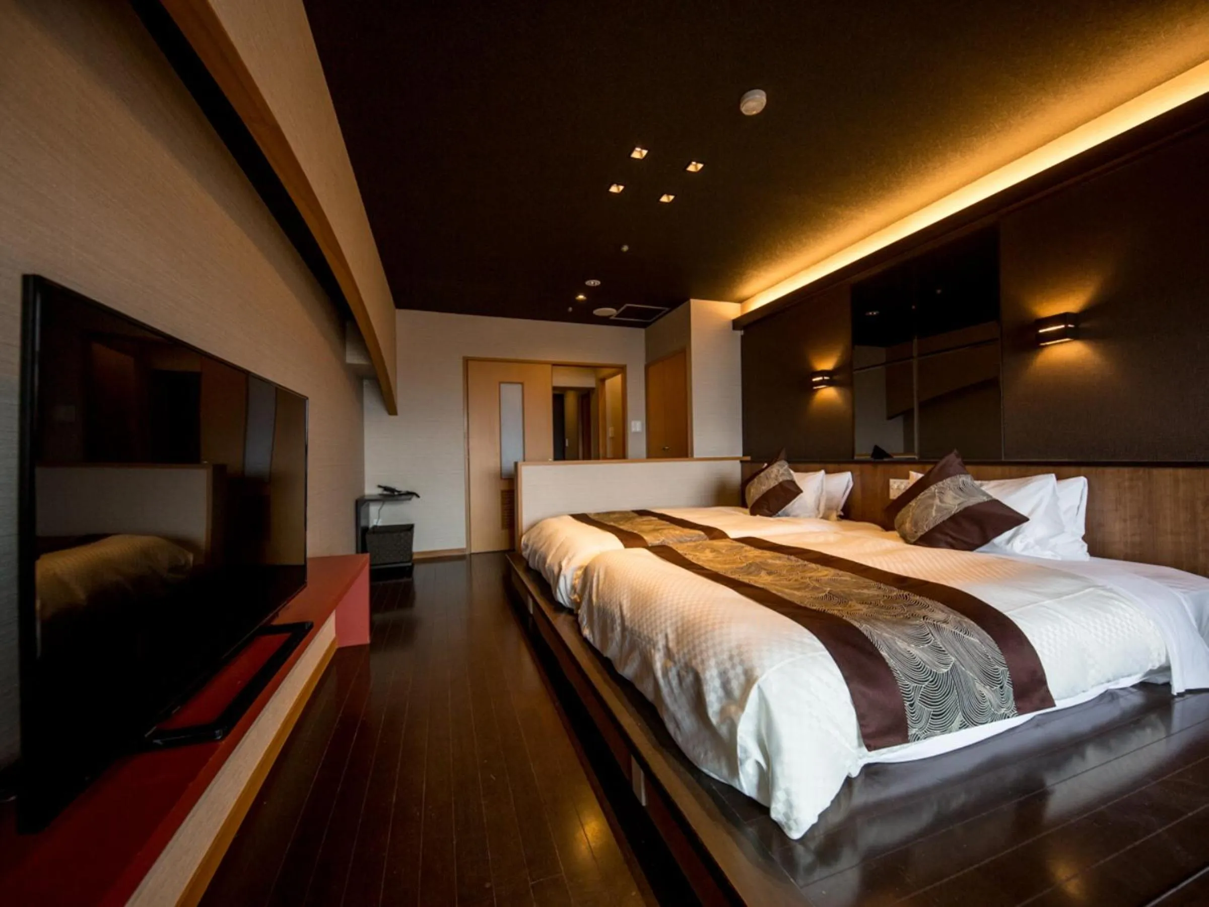 Bed in LiVEMAX RESORT Aki Miyajima