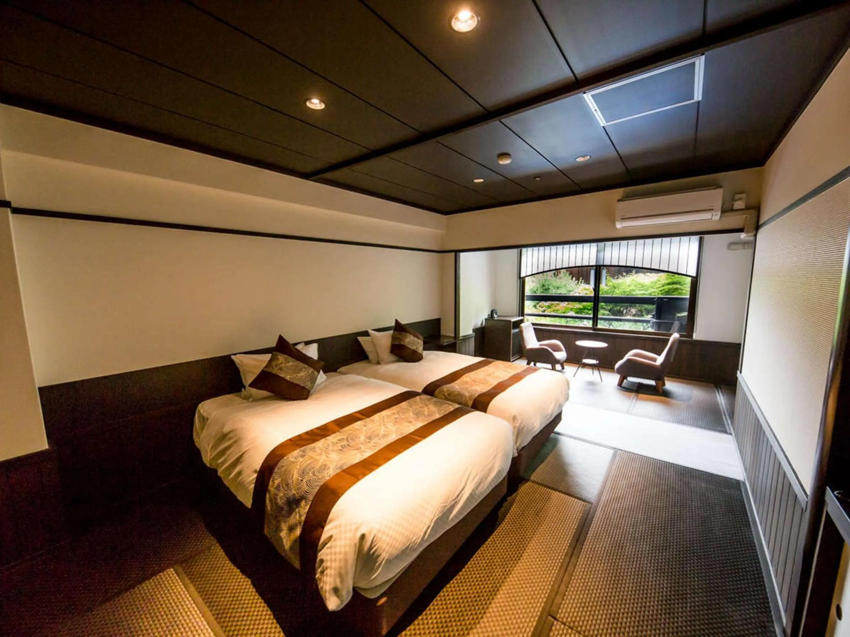 Bed in LiVEMAX RESORT Aki Miyajima