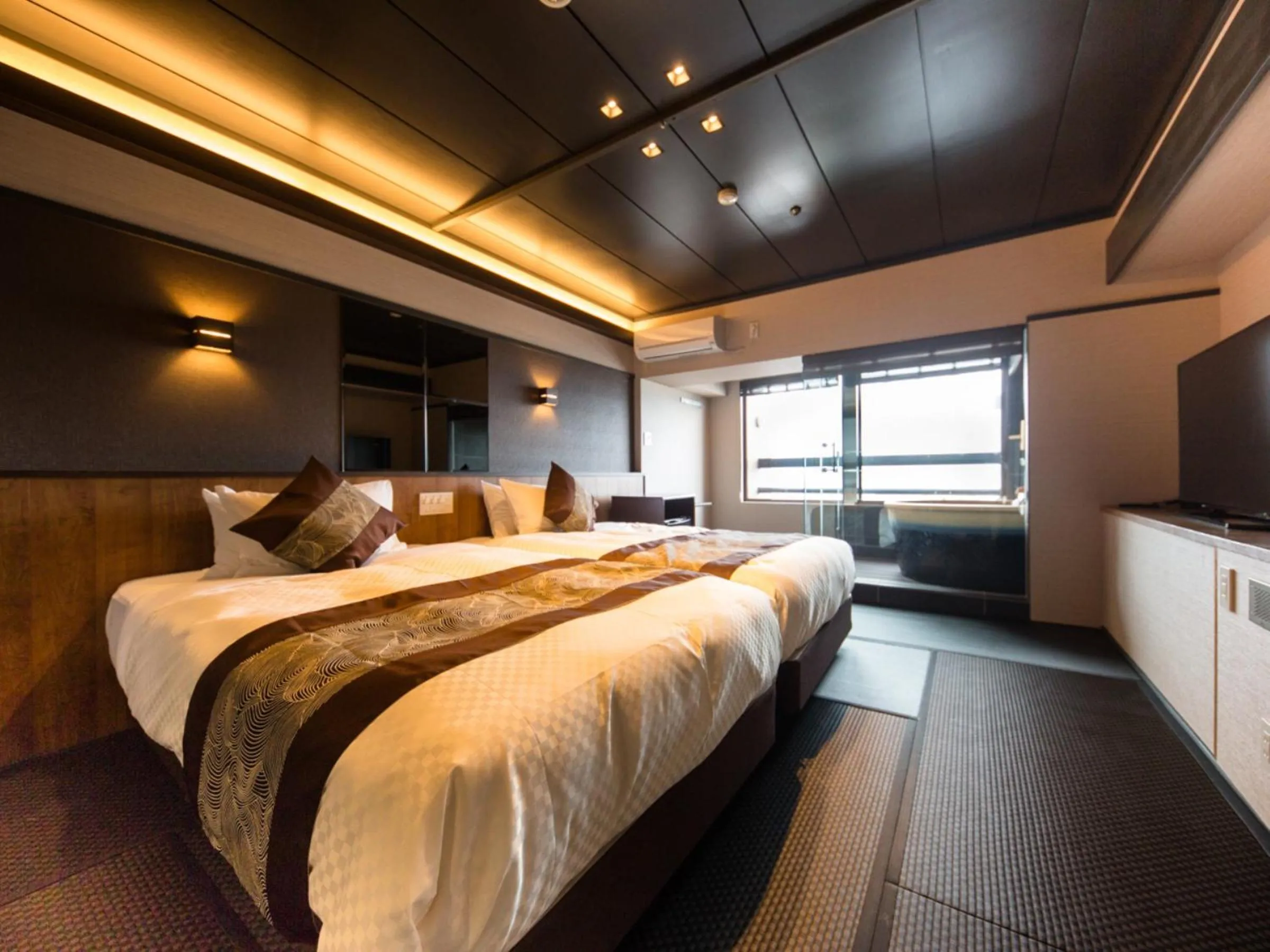 Bed in LiVEMAX RESORT Aki Miyajima