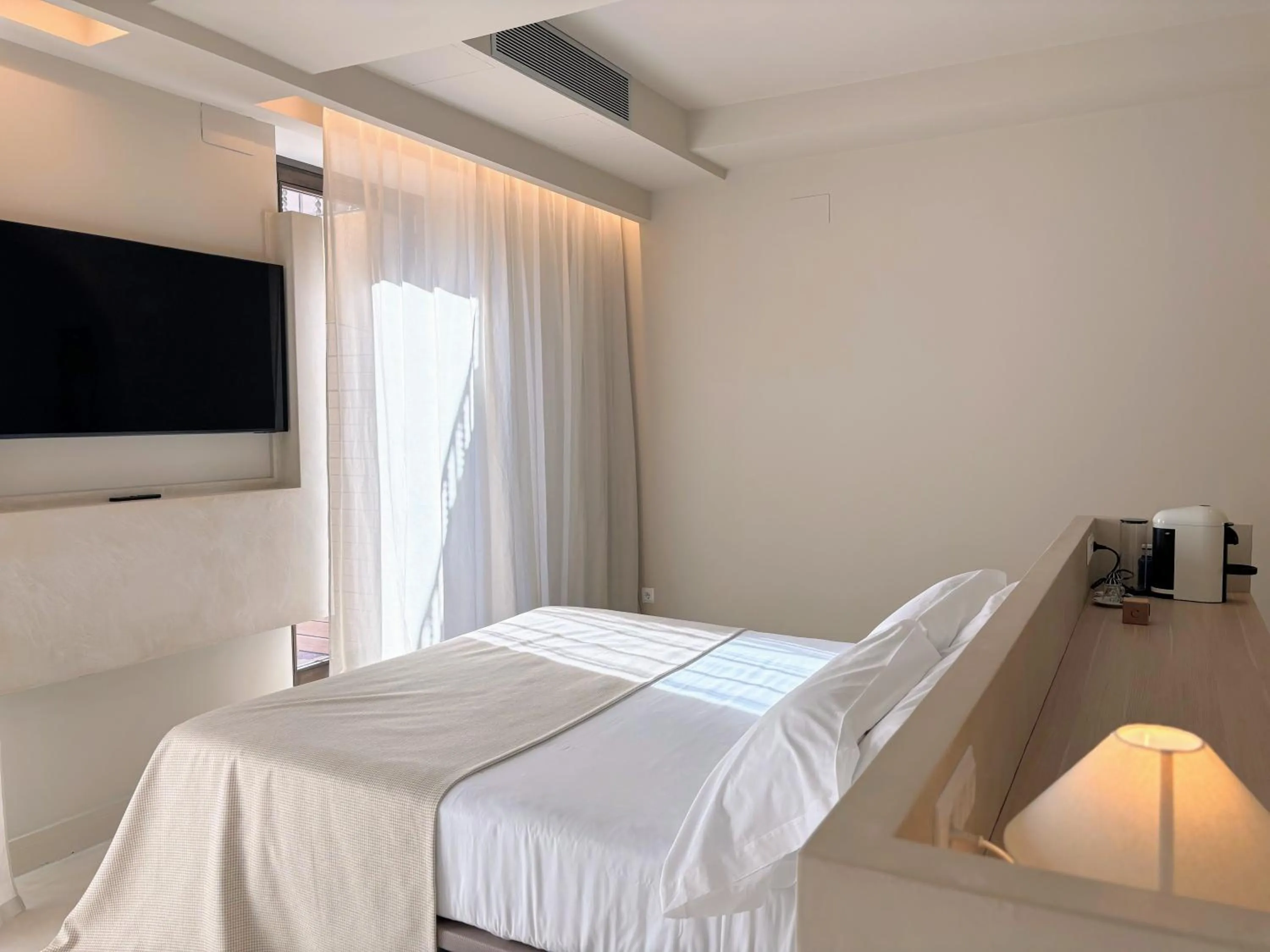 Bed in Les Clarisses Boutique Hotel