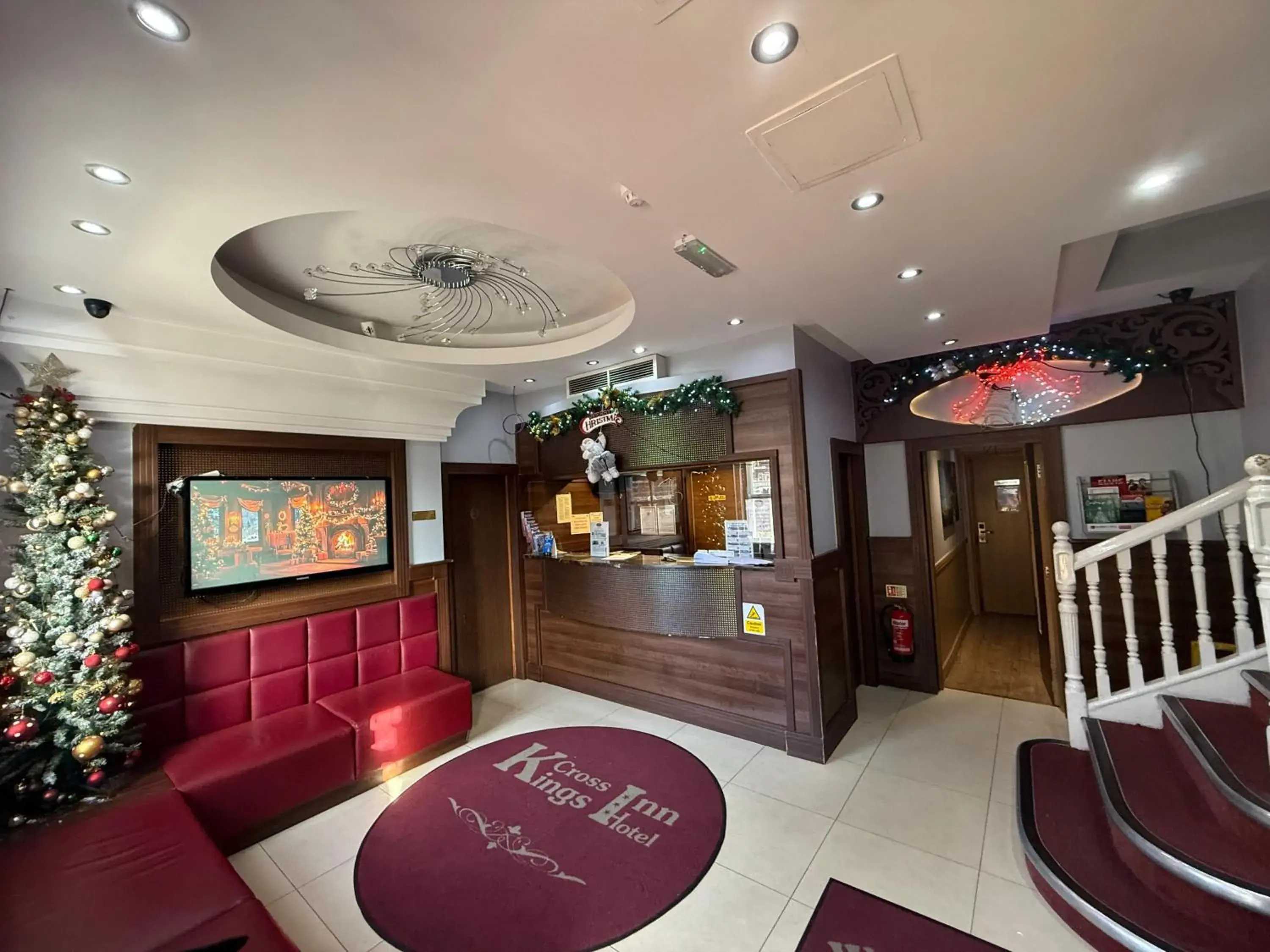 Lobby or reception in Kings Cross Inn Hotel Lobby or reception in Kings Cross Inn Hotel