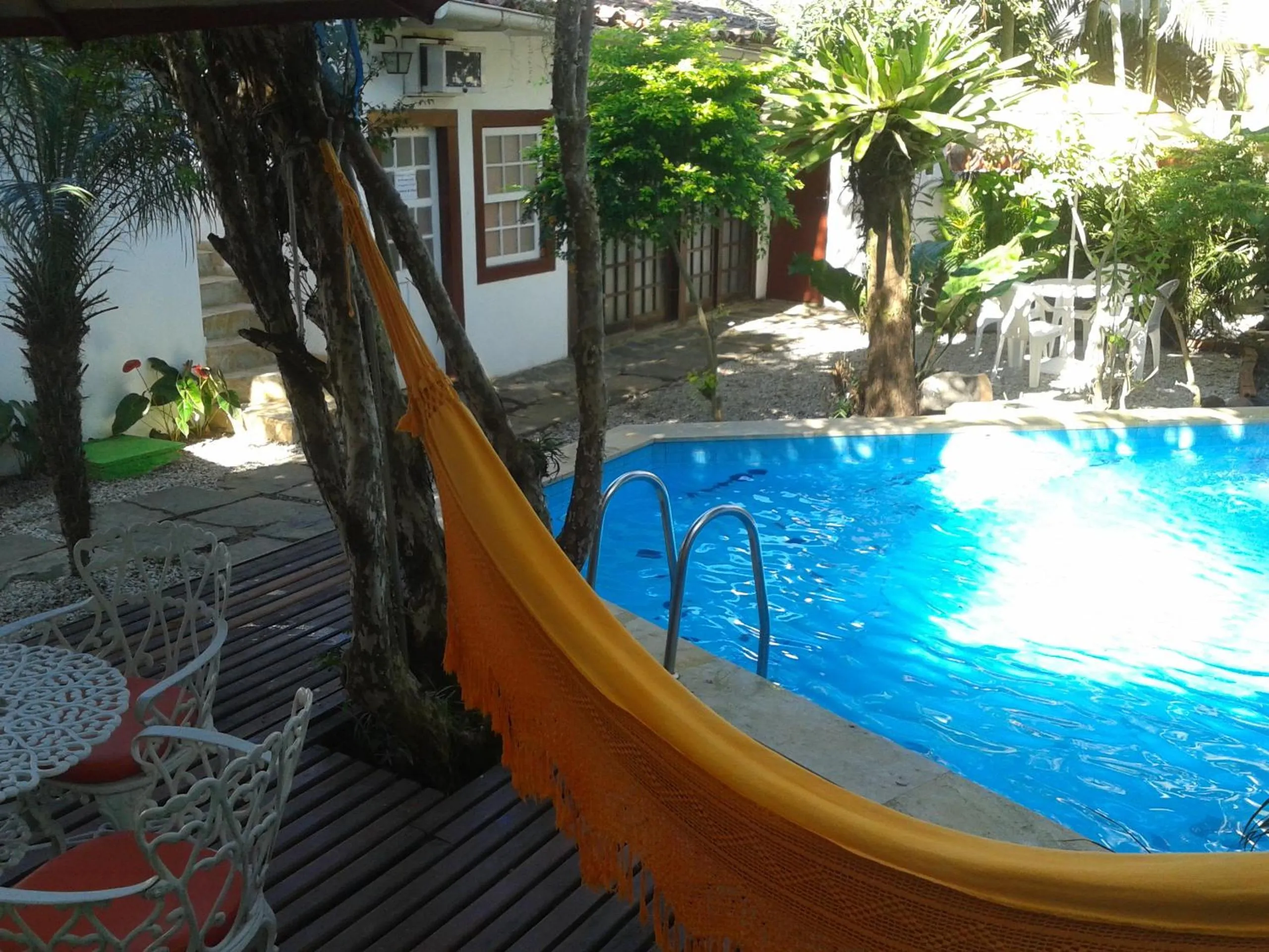 Swimming pool in Pousada Arte Colonial - Casarão Histórico do Séc XVIII - Lancha Própria