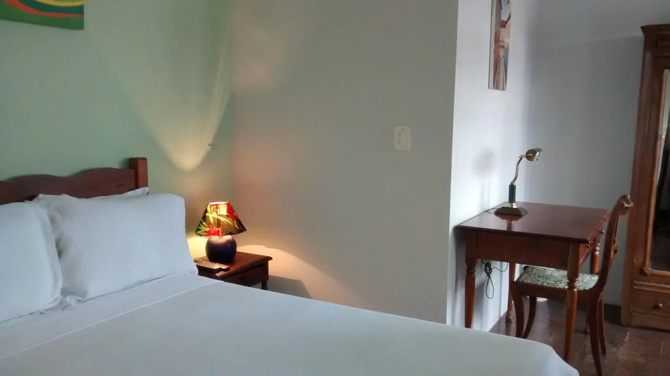 Photo of the whole room in Pousada Arte Colonial - Casarão Histórico do Séc XVIII - Lancha Própria