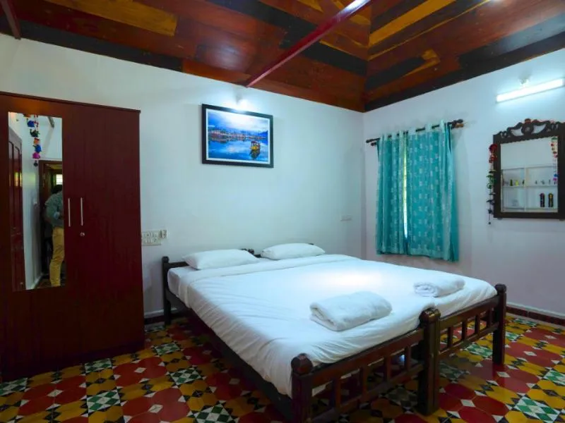 Bed in Anamala Serenity Homestay Kerala