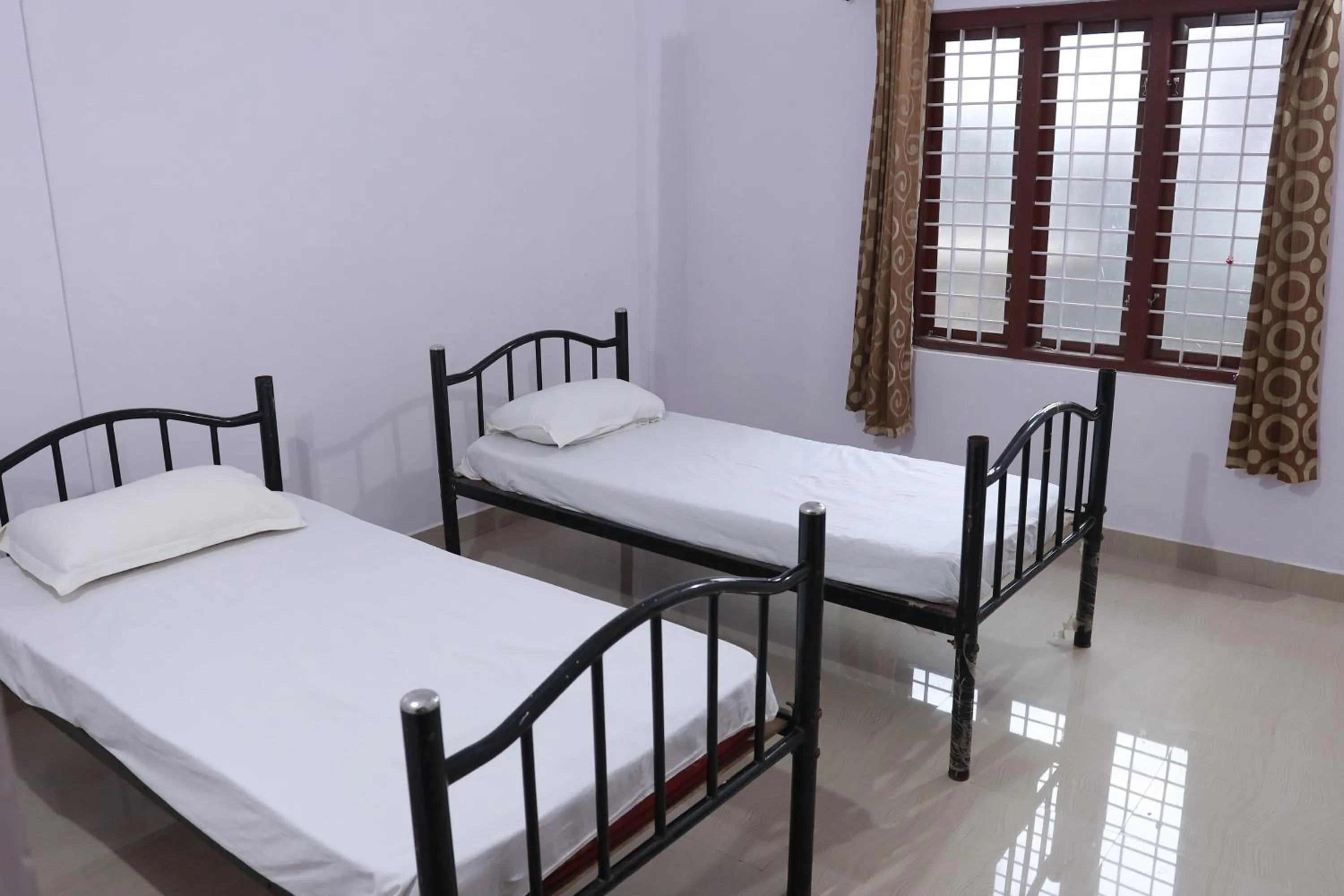 Bed in Anamala Serenity Homestay Kerala