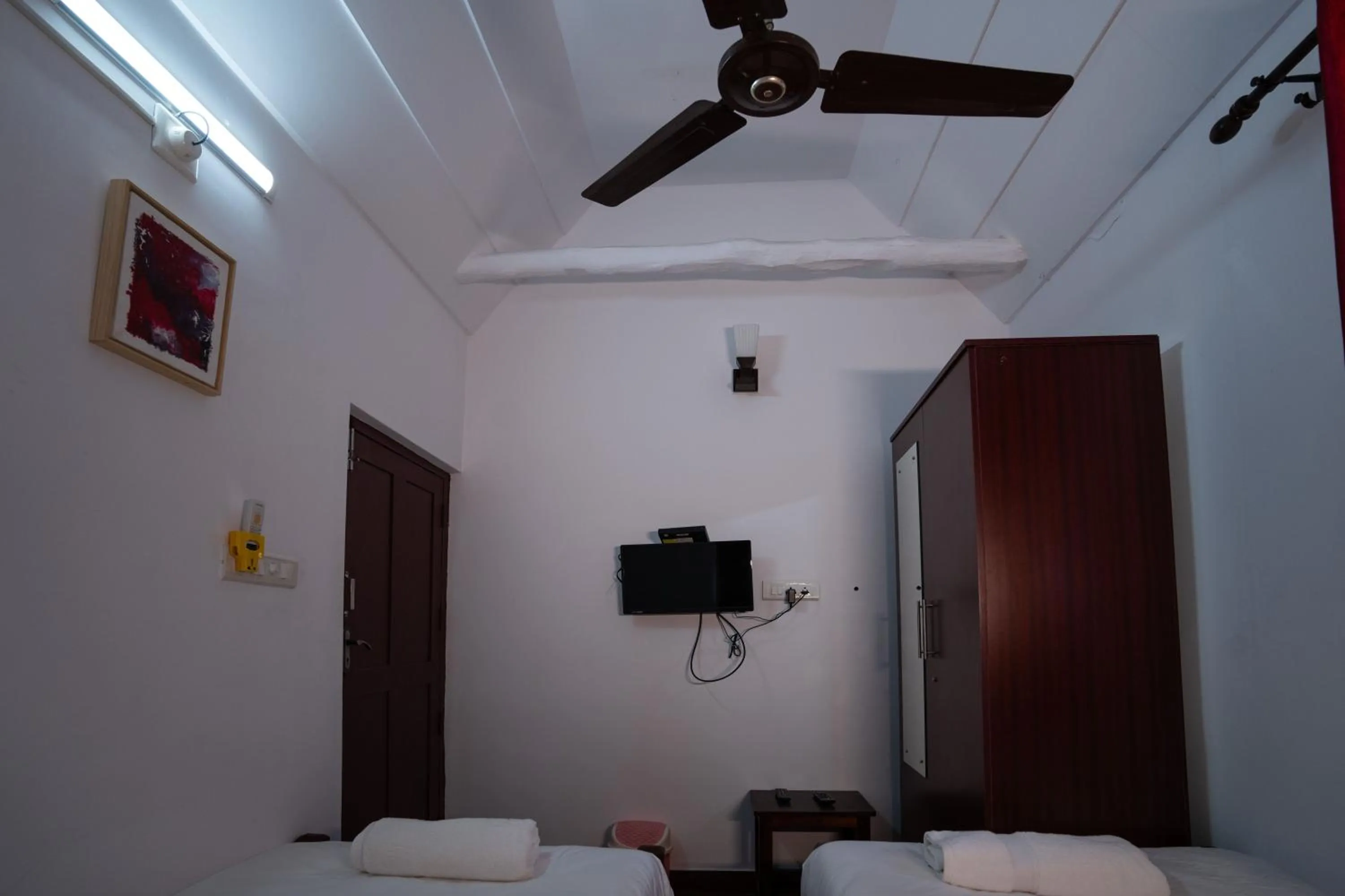 Communal lounge/ TV room, Bed in Anamala Serenity Homestay Kerala