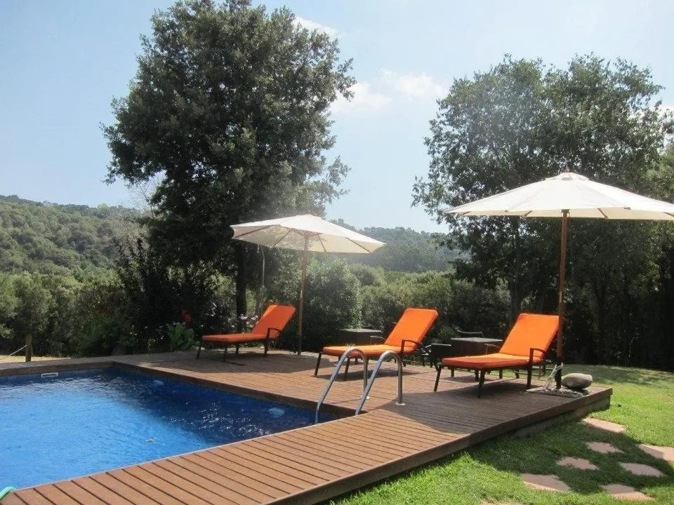 Swimming pool in Hotel Rural Can Vila