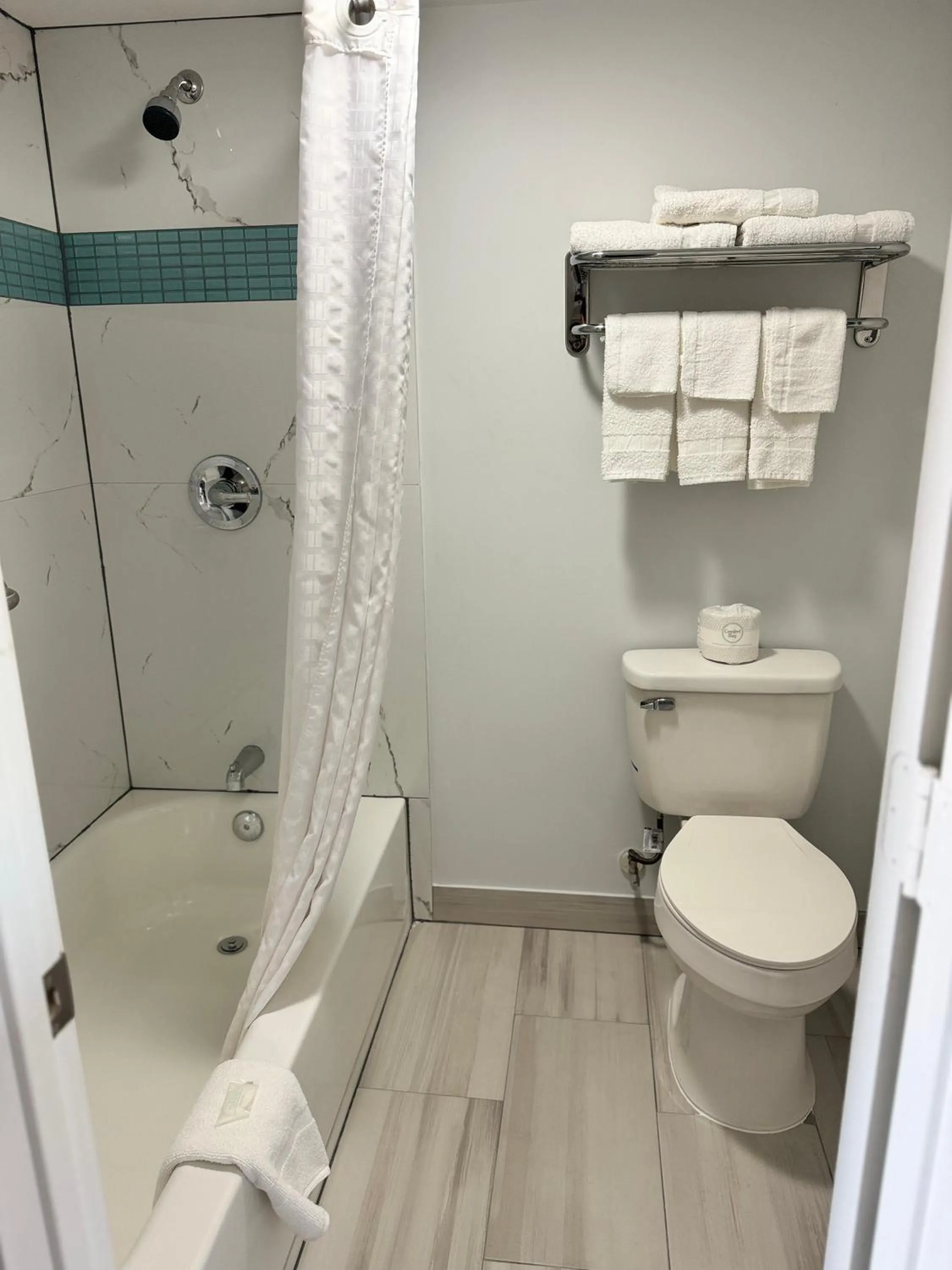 Shower in Continental Inn and Suites Nacogdoches TX SFA University Downtown