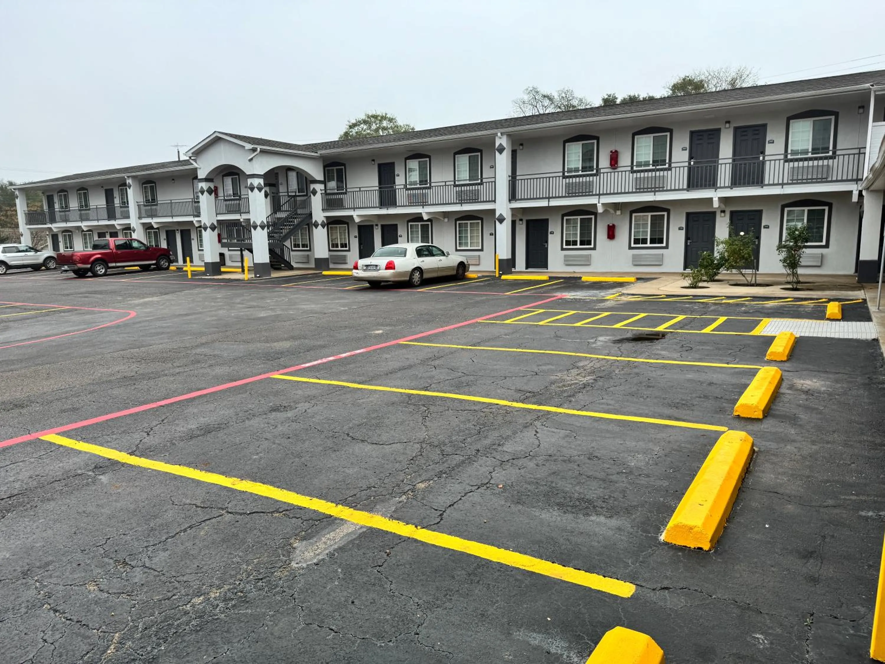 Property building in Continental Inn and Suites Nacogdoches TX SFA University Downtown