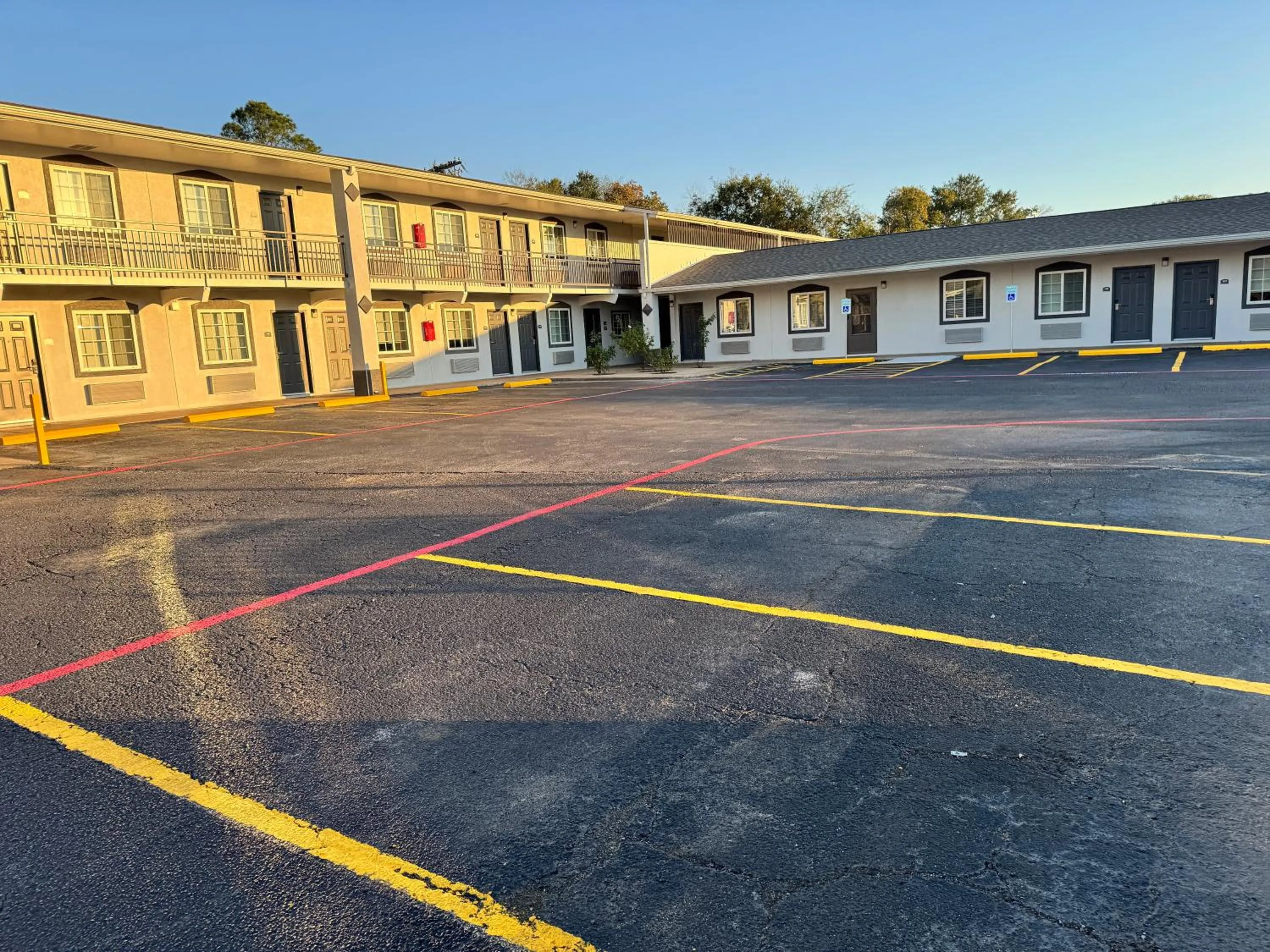 Property building in Continental Inn and Suites Nacogdoches TX SFA University Downtown