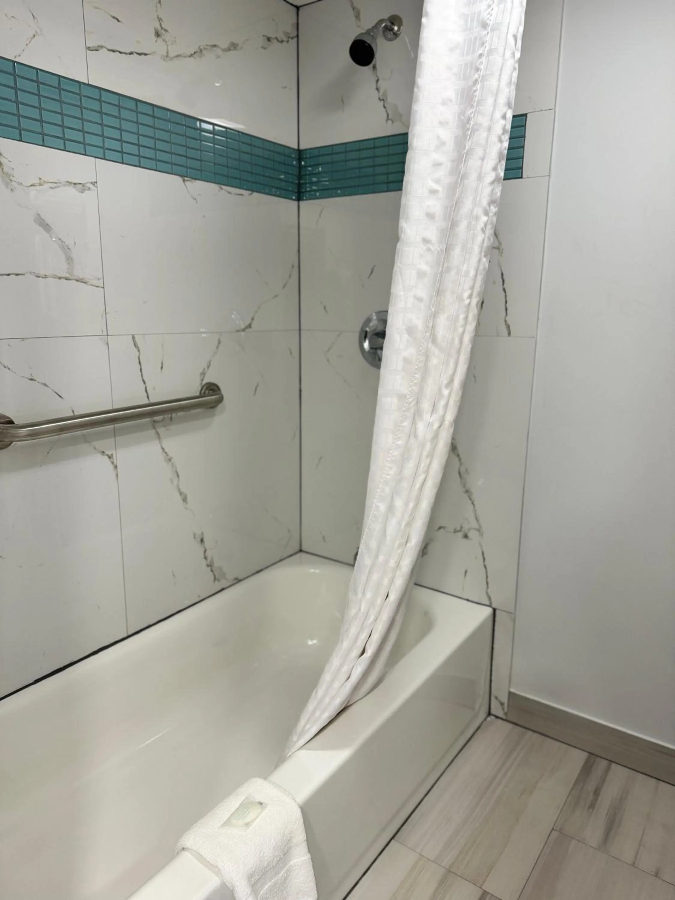 Shower in Continental Inn and Suites Nacogdoches TX SFA University Downtown