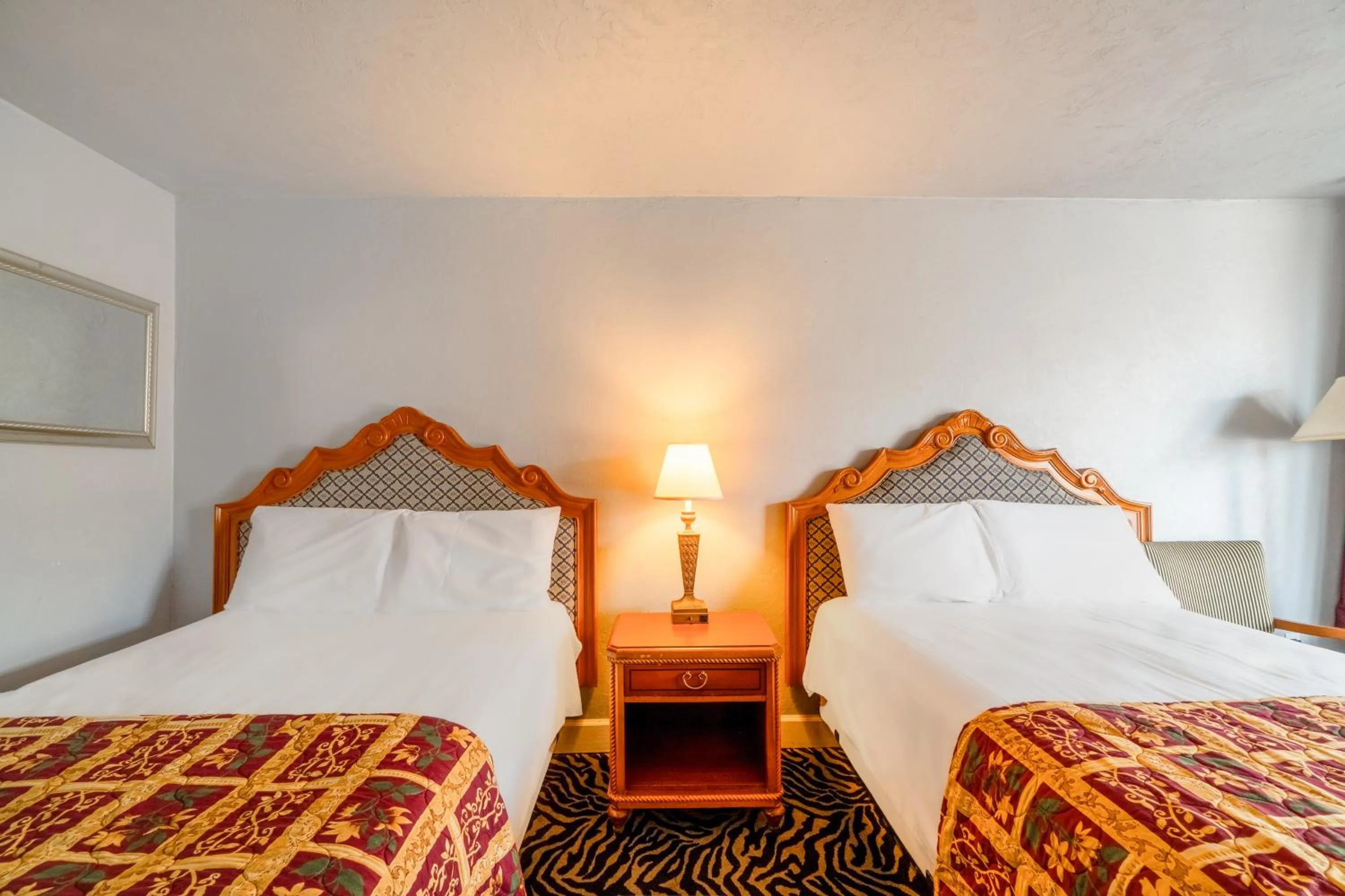 Bedroom, Bed in Castle inn & suites by OYO Lawton
