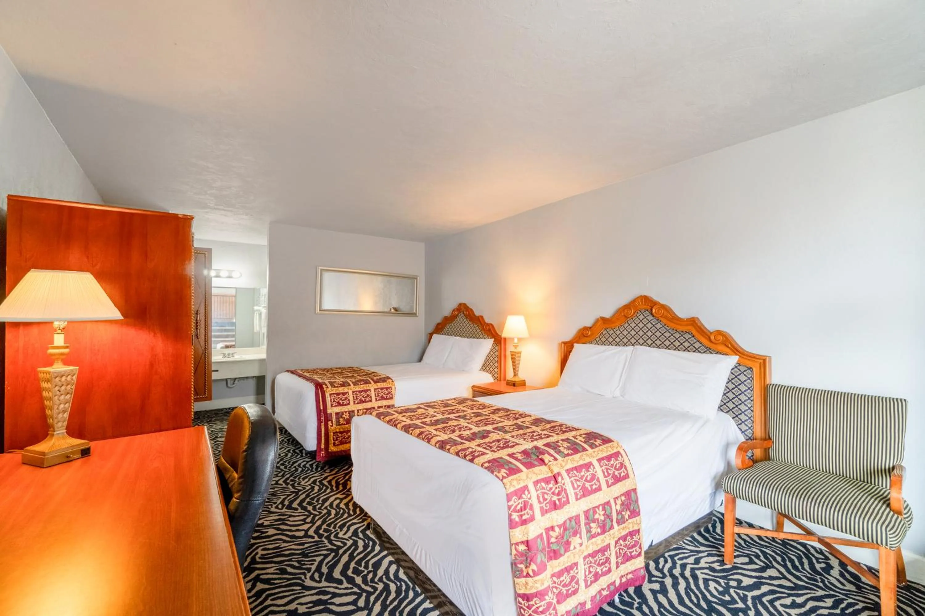 Bedroom, Bed in Castle inn & suites by OYO Lawton