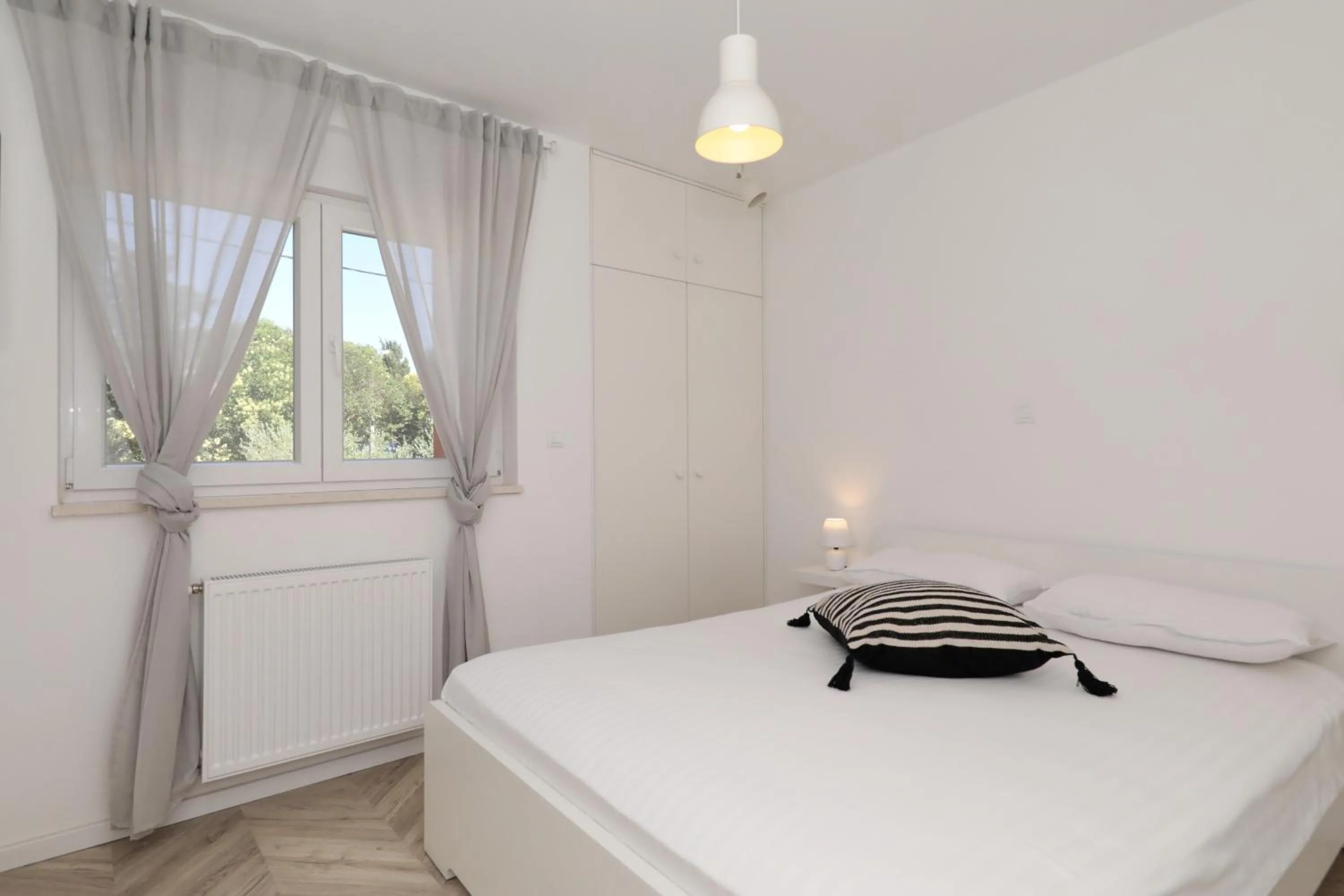 Bed in Apartments Ivanov