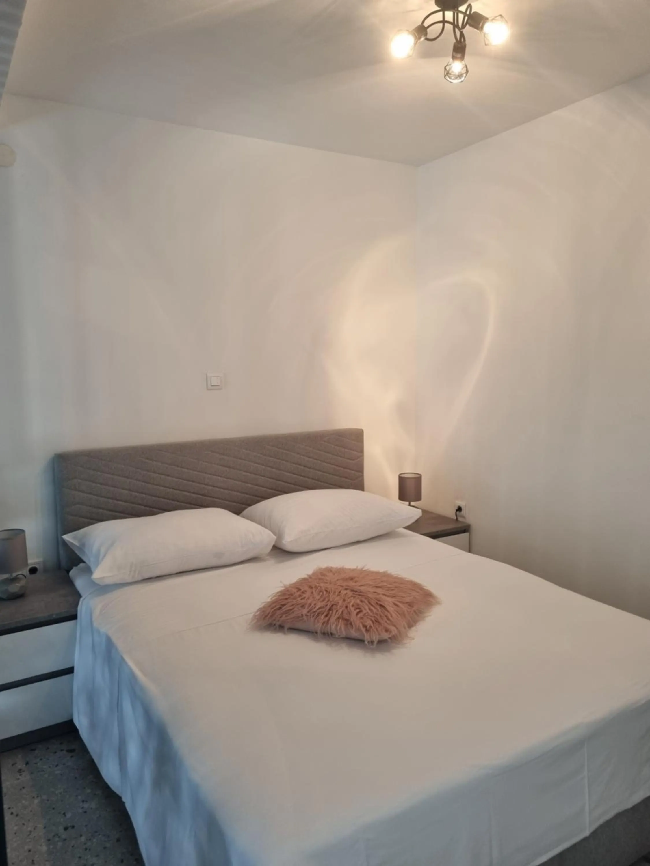 Bed in Apartments Ivanov