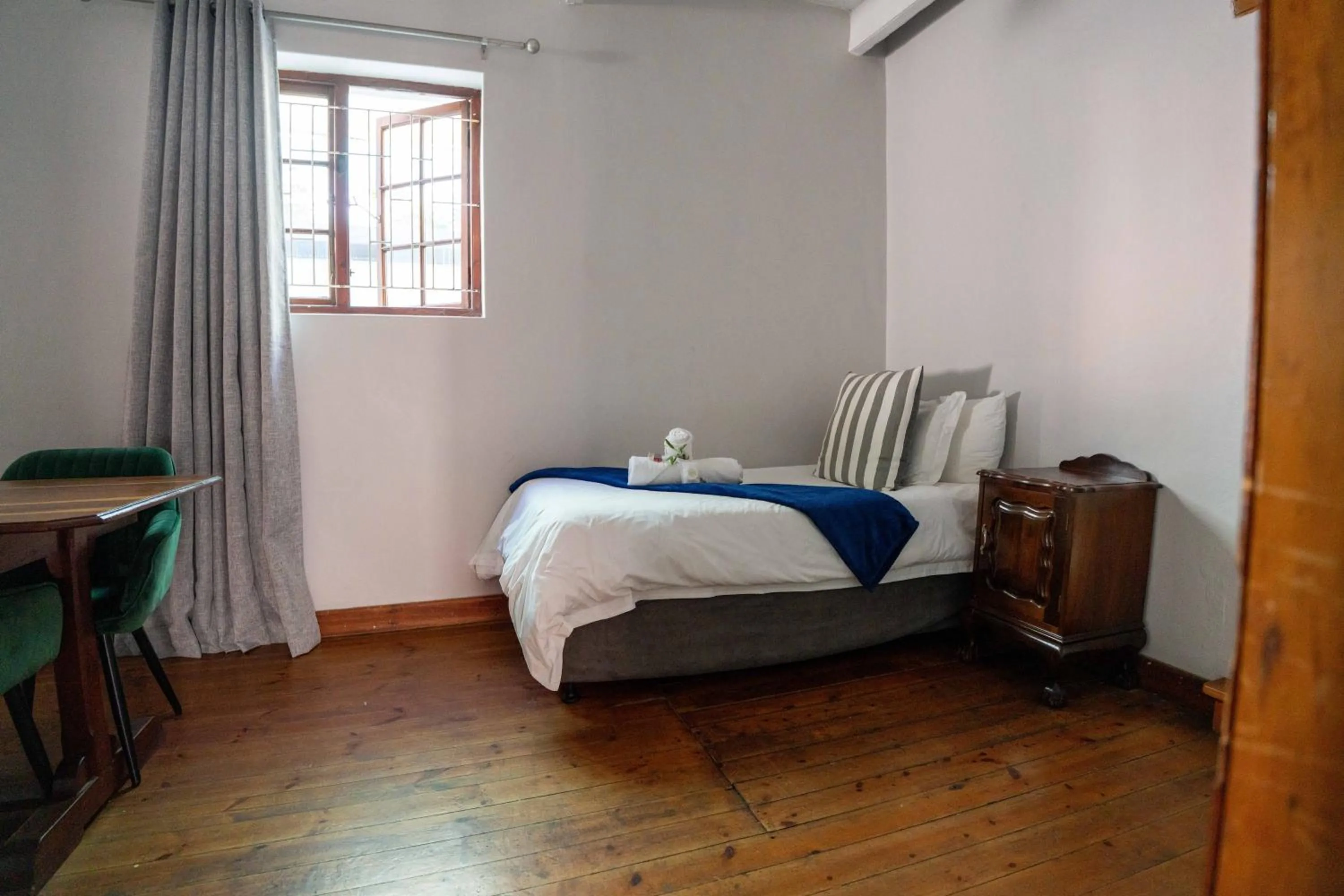 Bed in Olive Tree Lodge