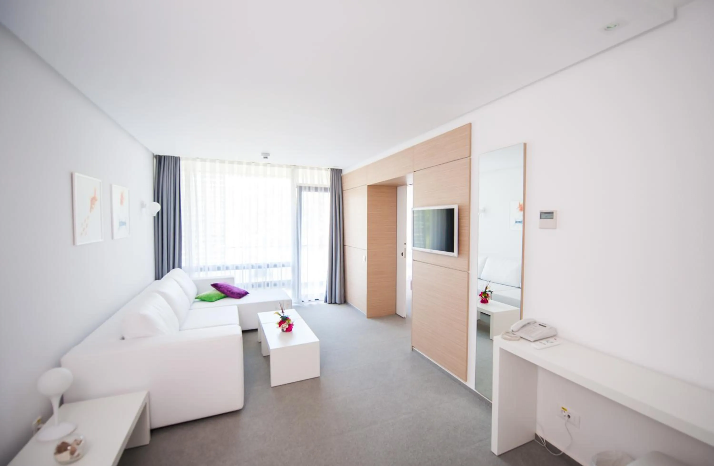 Living room, Bed in Hotel Melodia