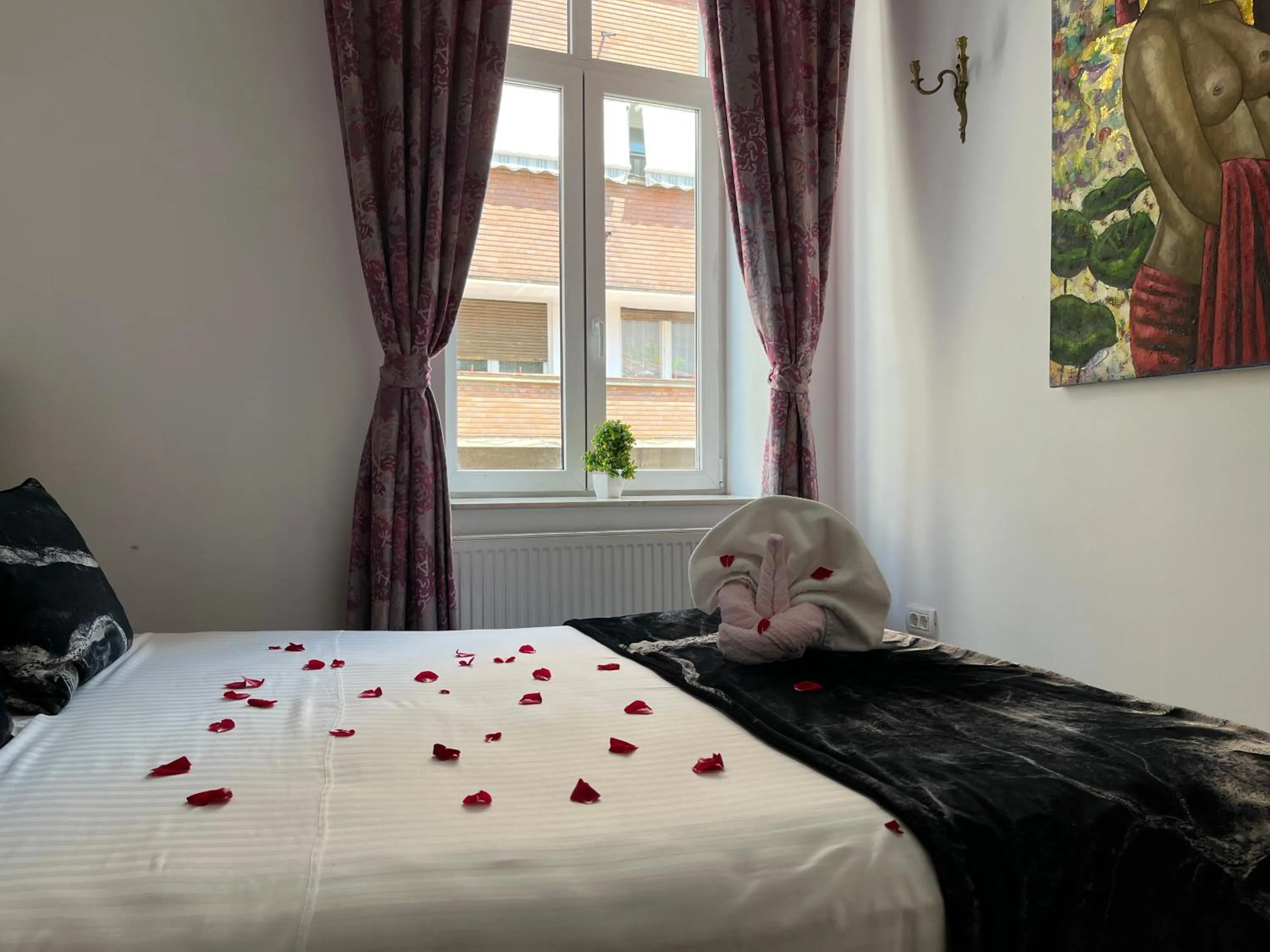 Bed in Hotel Michelangelo