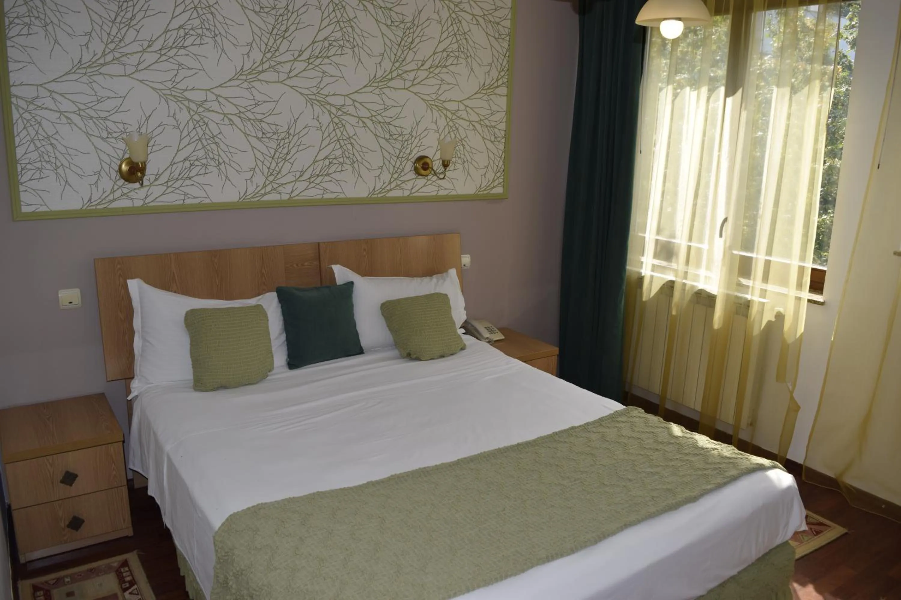 Bed in Hotel Michelangelo