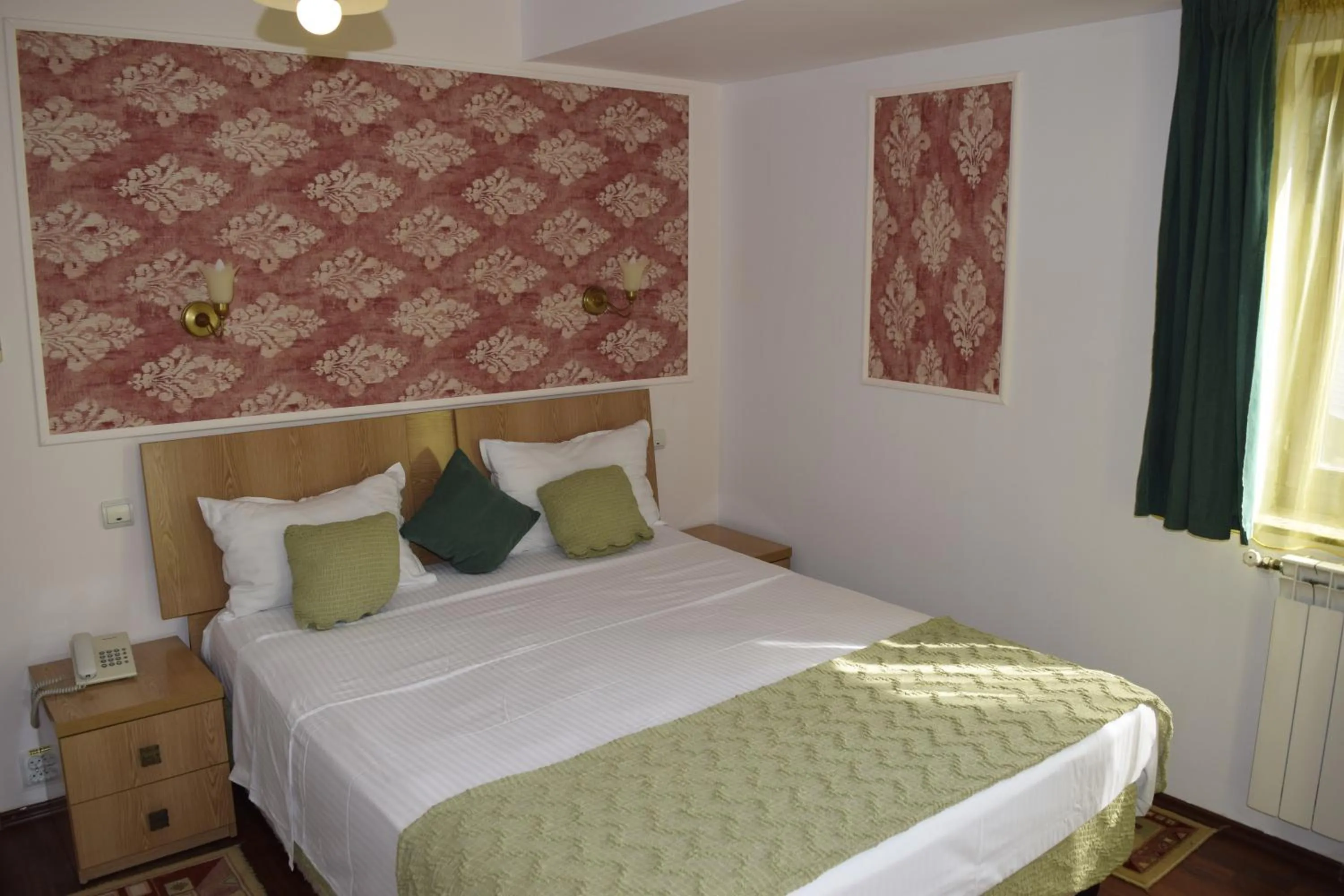 Bed in Hotel Michelangelo