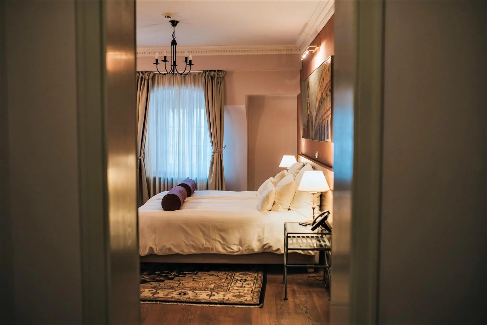 Bed in Hotel Mitra, Story Hotels