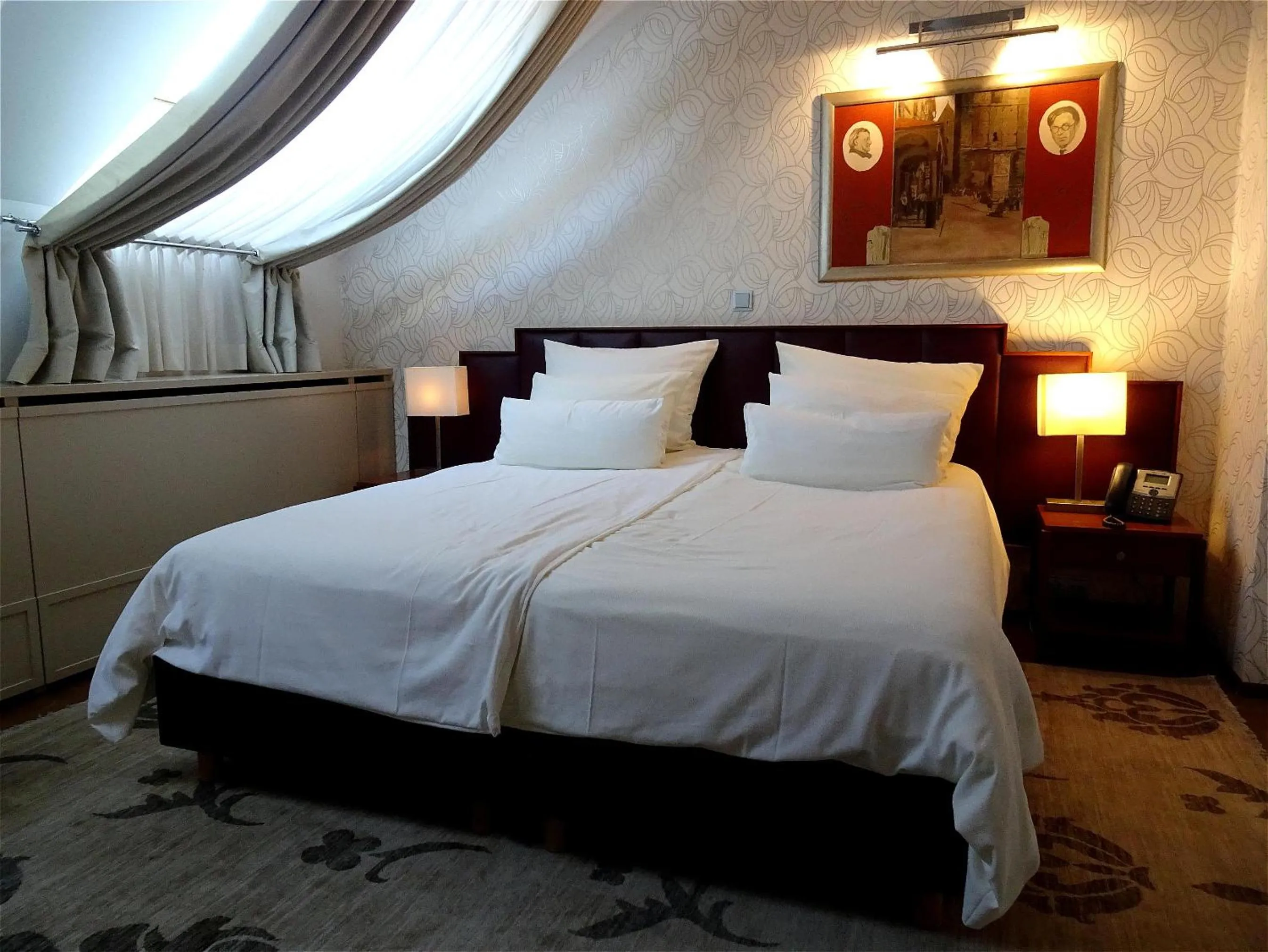 Bed in Hotel Mitra, Story Hotels